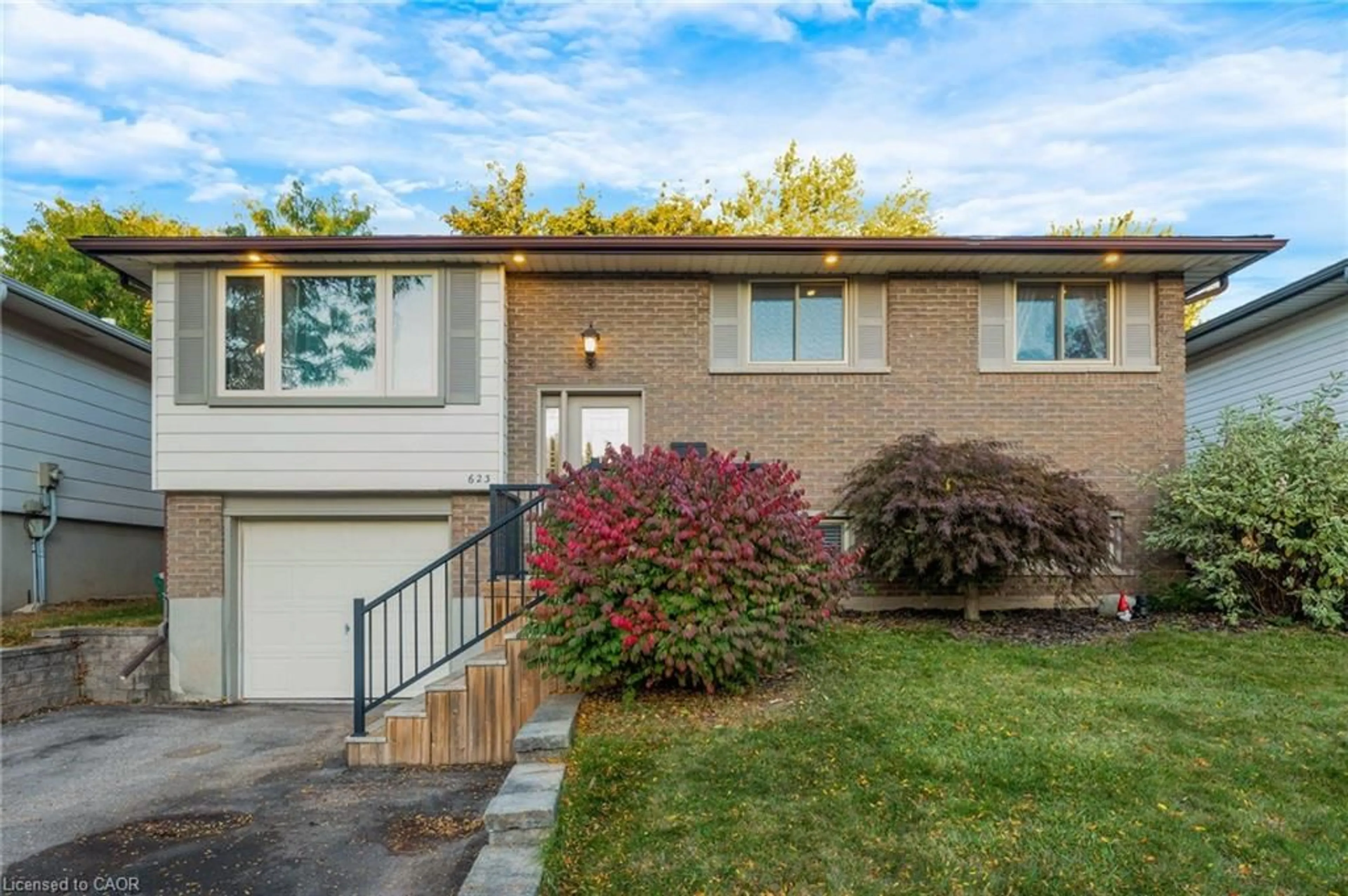 Home with brick exterior material, street for 623 Pioneer Dr, Kitchener Ontario N2P 1L7