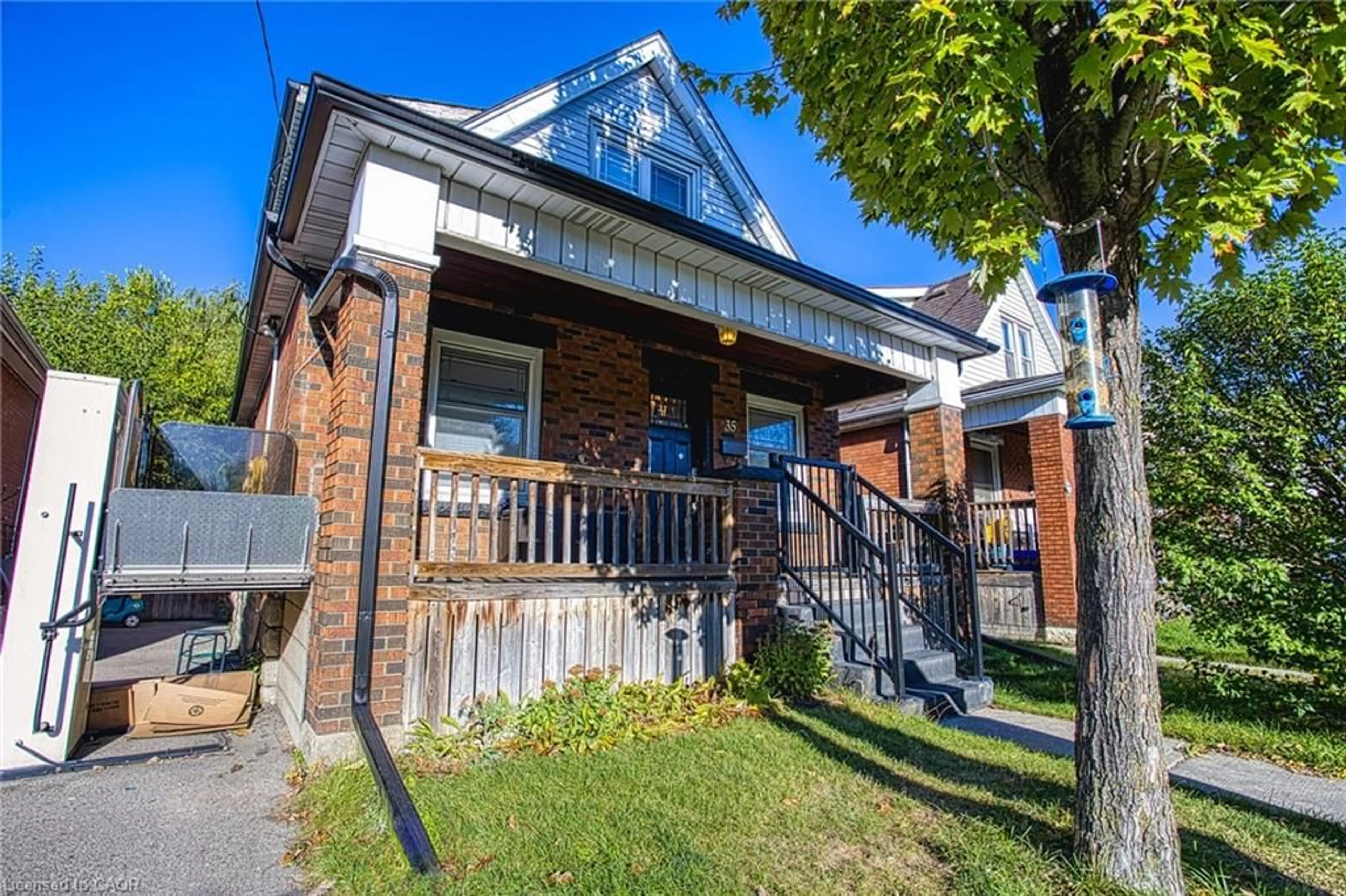 Home with brick exterior material, street for 35 Cope St, Hamilton Ontario L8H 5A8