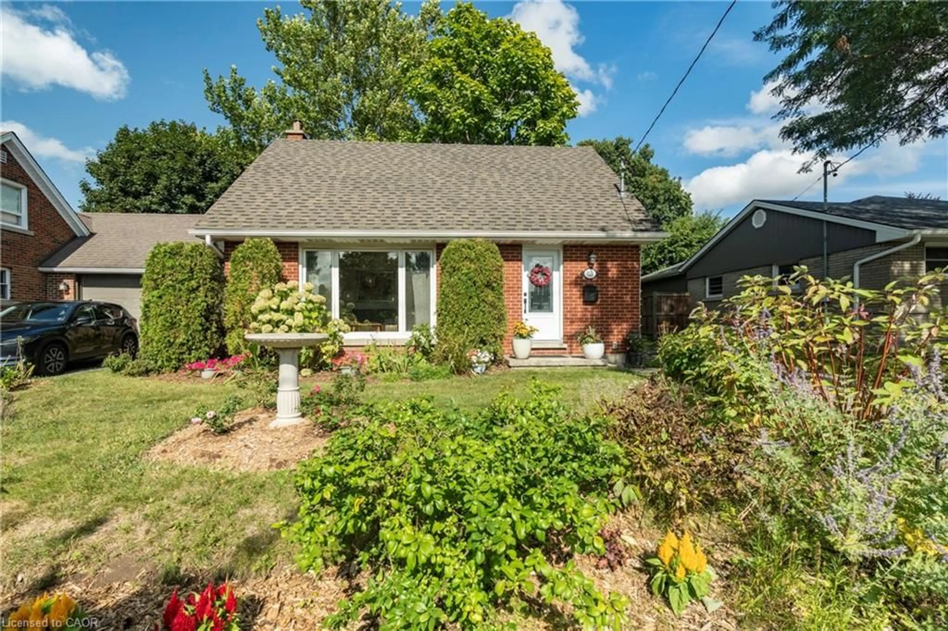 Home with brick exterior material, street for 110 Ellis Cres, Waterloo Ontario N2J 2B8