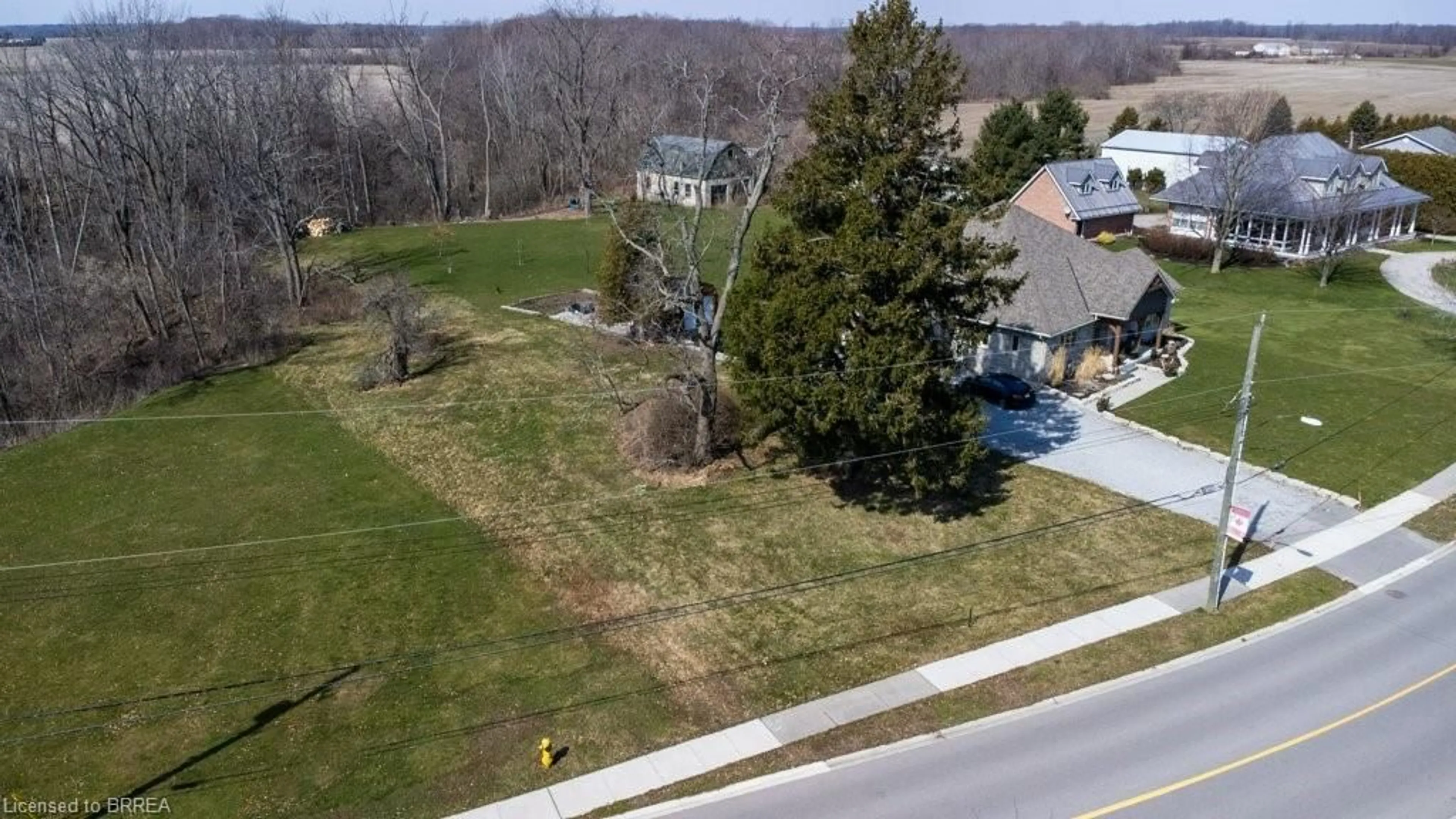A pic from outside/outdoor area/front of a property/back of a property/a pic from drone, street for 75 Wolven St, Port Rowan Ontario N0E 1M0