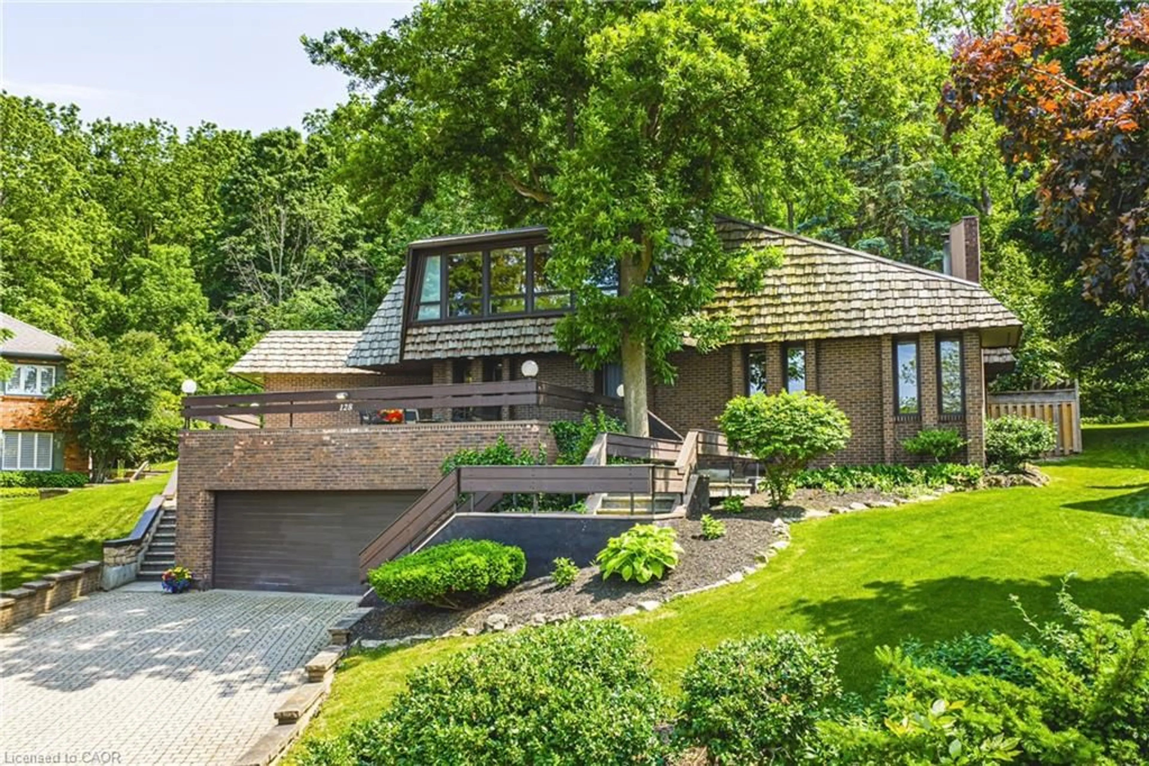 Home with brick exterior material, street for 128 Bunker Hill Dr, Hamilton Ontario L8K 5X5