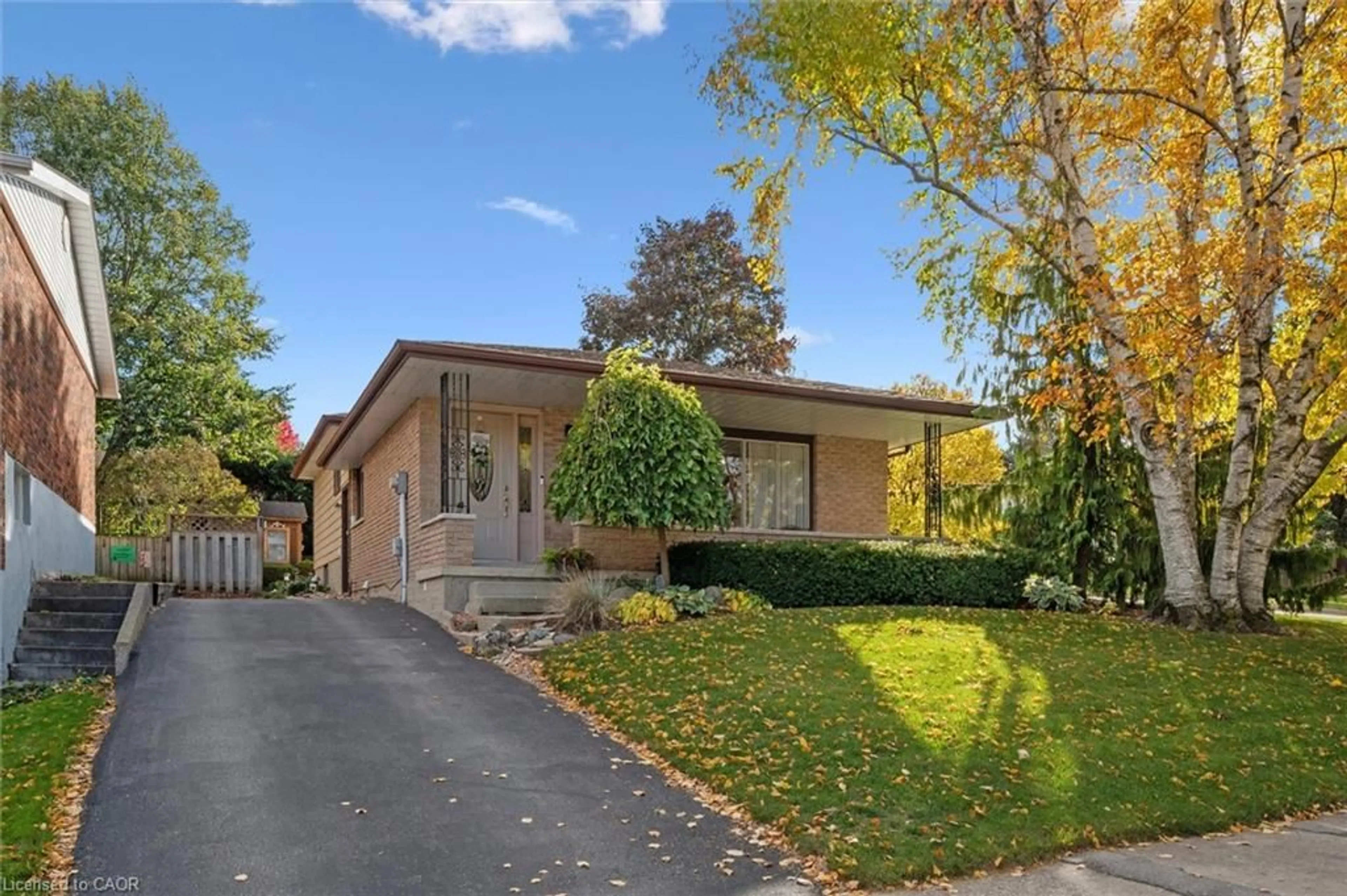 Home with brick exterior material, street for 61 Sandsprings Cres, Kitchener Ontario N2E 2A5
