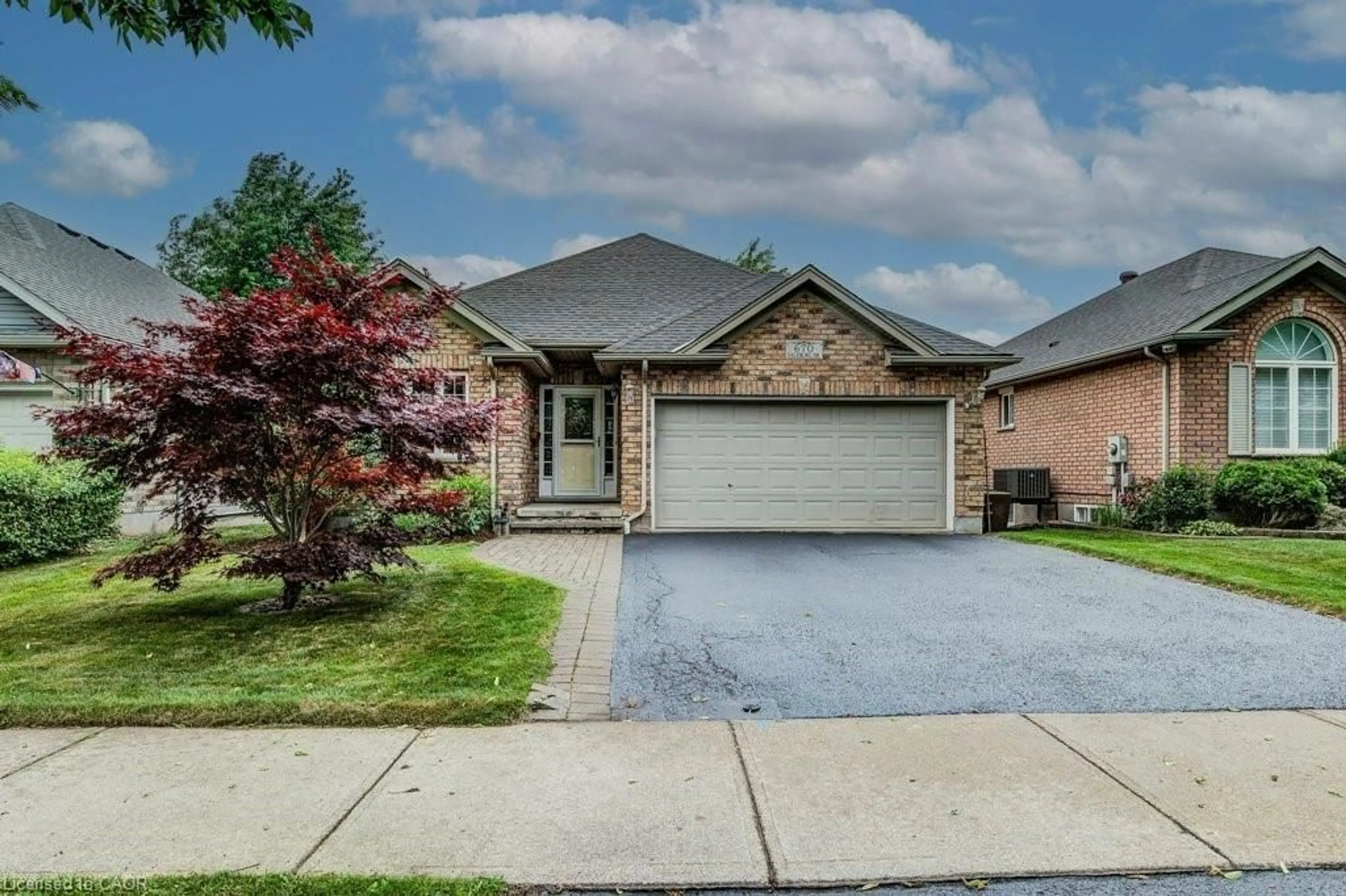 Home with brick exterior material, street for 670 Salzburg Dr, Waterloo Ontario N2V 2N8