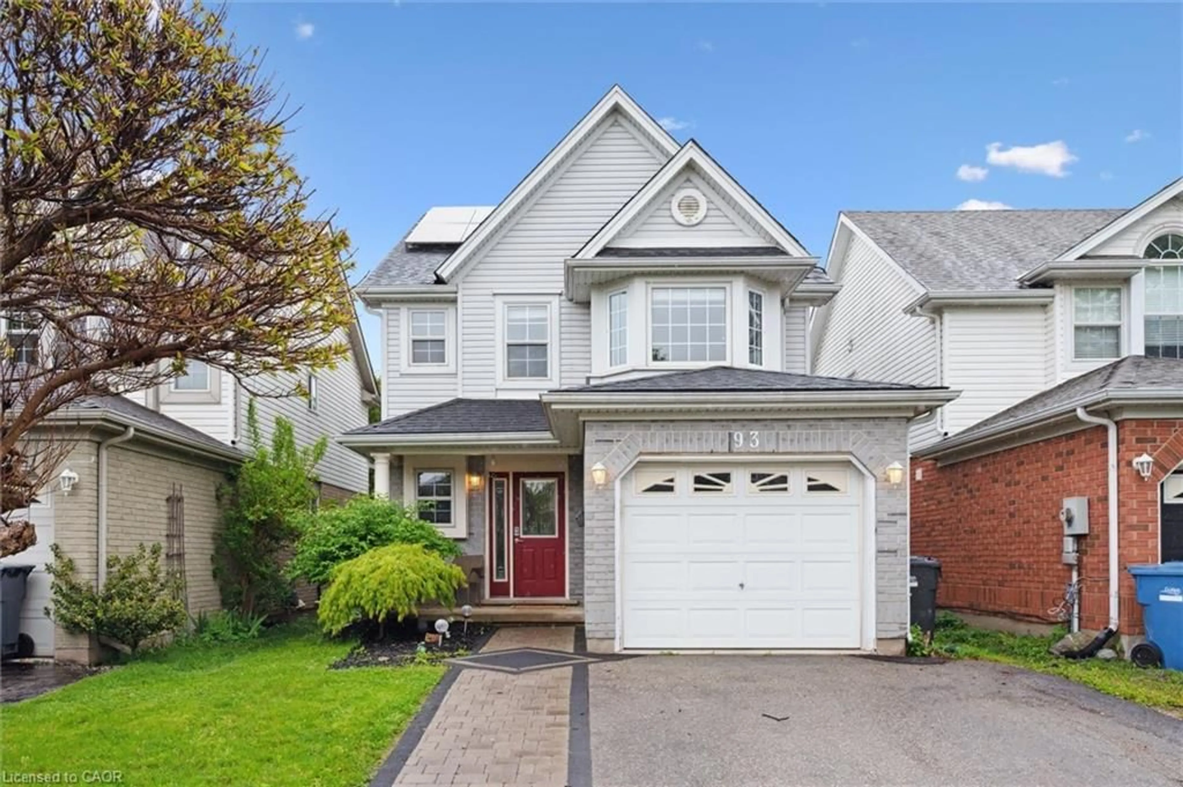 Home with vinyl exterior material, street for 93 Doyle Dr, Guelph Ontario N1G 5B9