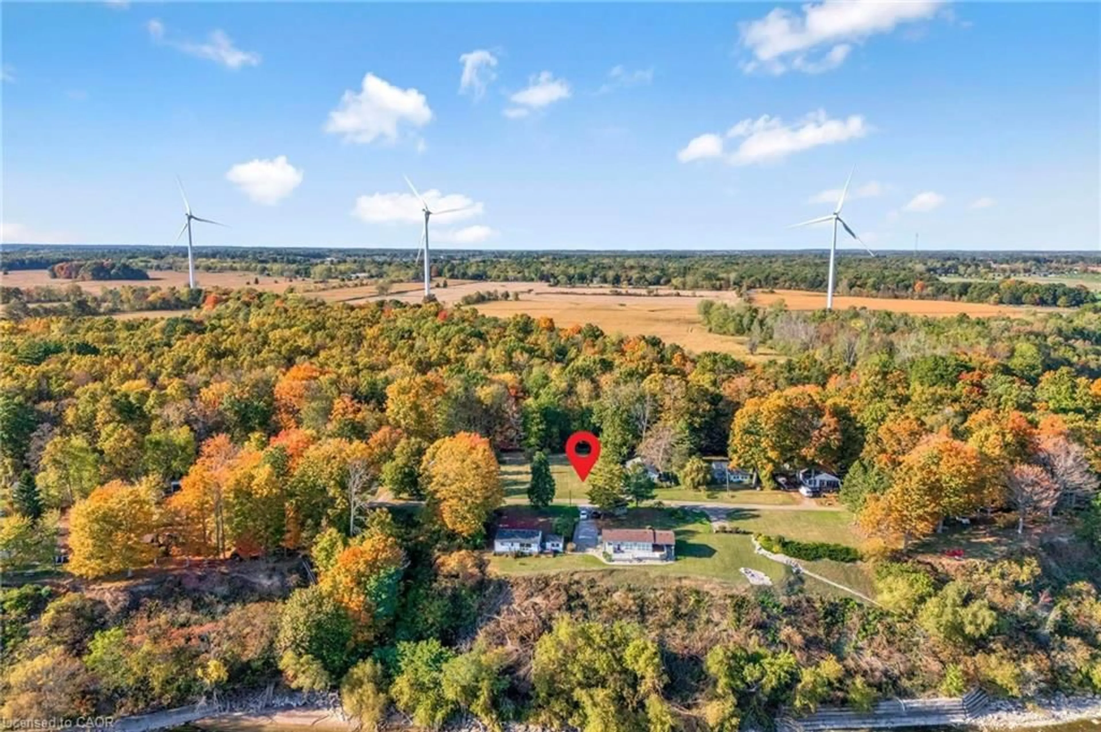 A pic from outside/outdoor area/front of a property/back of a property/a pic from drone, forest/trees view for 527 Avalon Lane, Simcoe Ontario N3Y 4K2