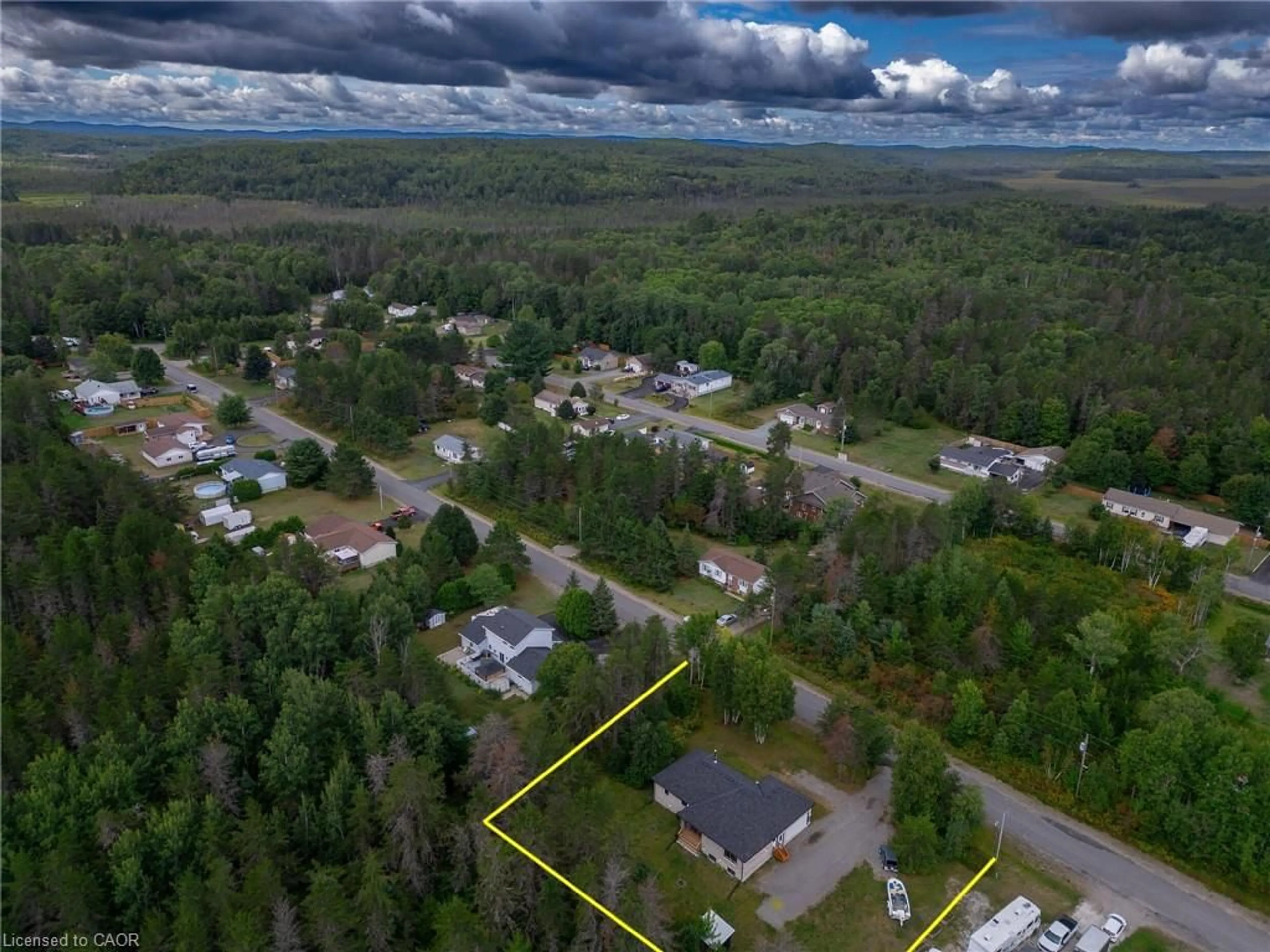 A pic from outside/outdoor area/front of a property/back of a property/a pic from drone, unknown for 125 Savicky Dr, Espanola Ontario P5E 1N3