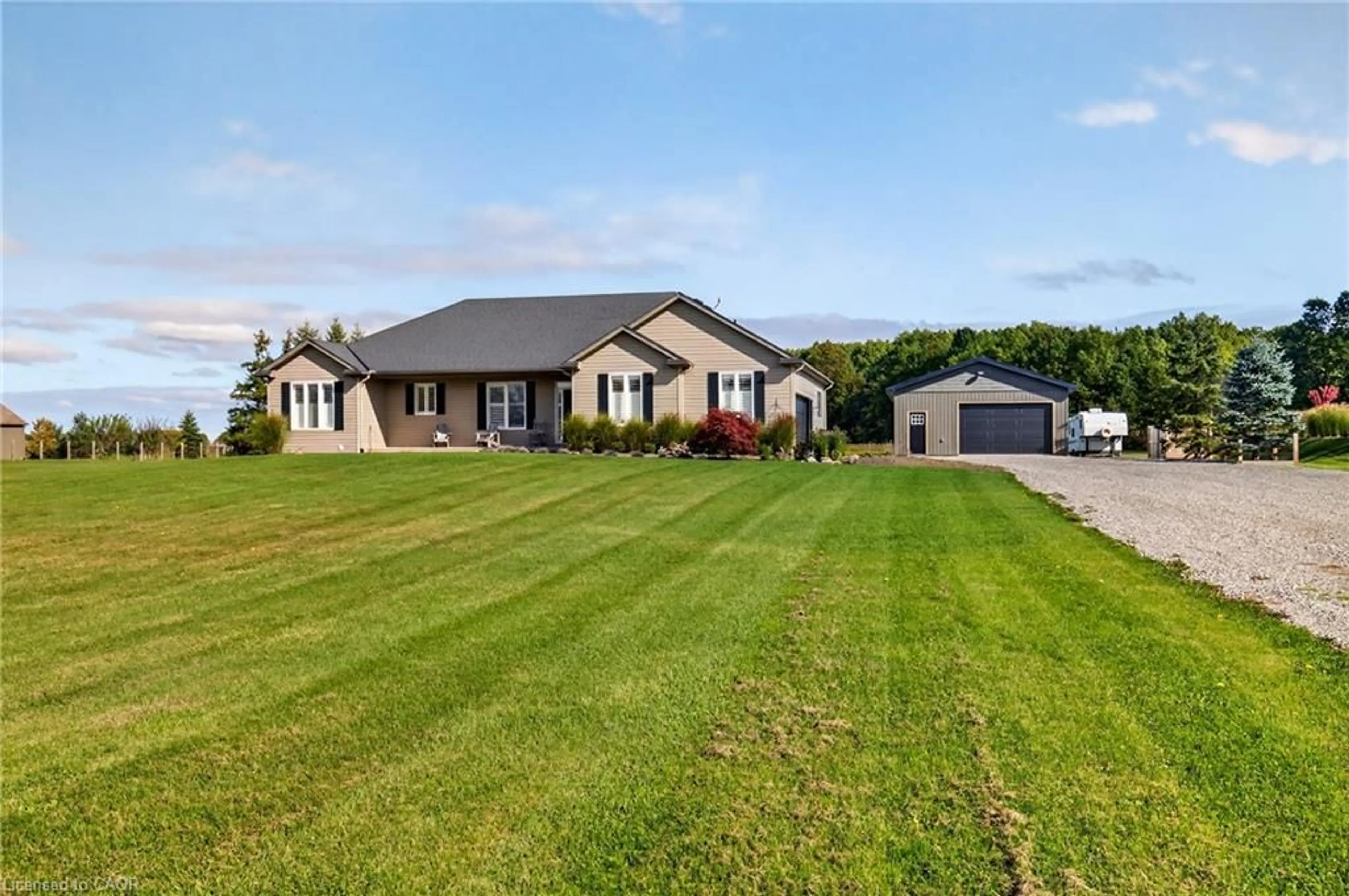 A pic from outside/outdoor area/front of a property/back of a property/a pic from drone, street for 849 River Rd, Fenwick Ontario L0S 1C0