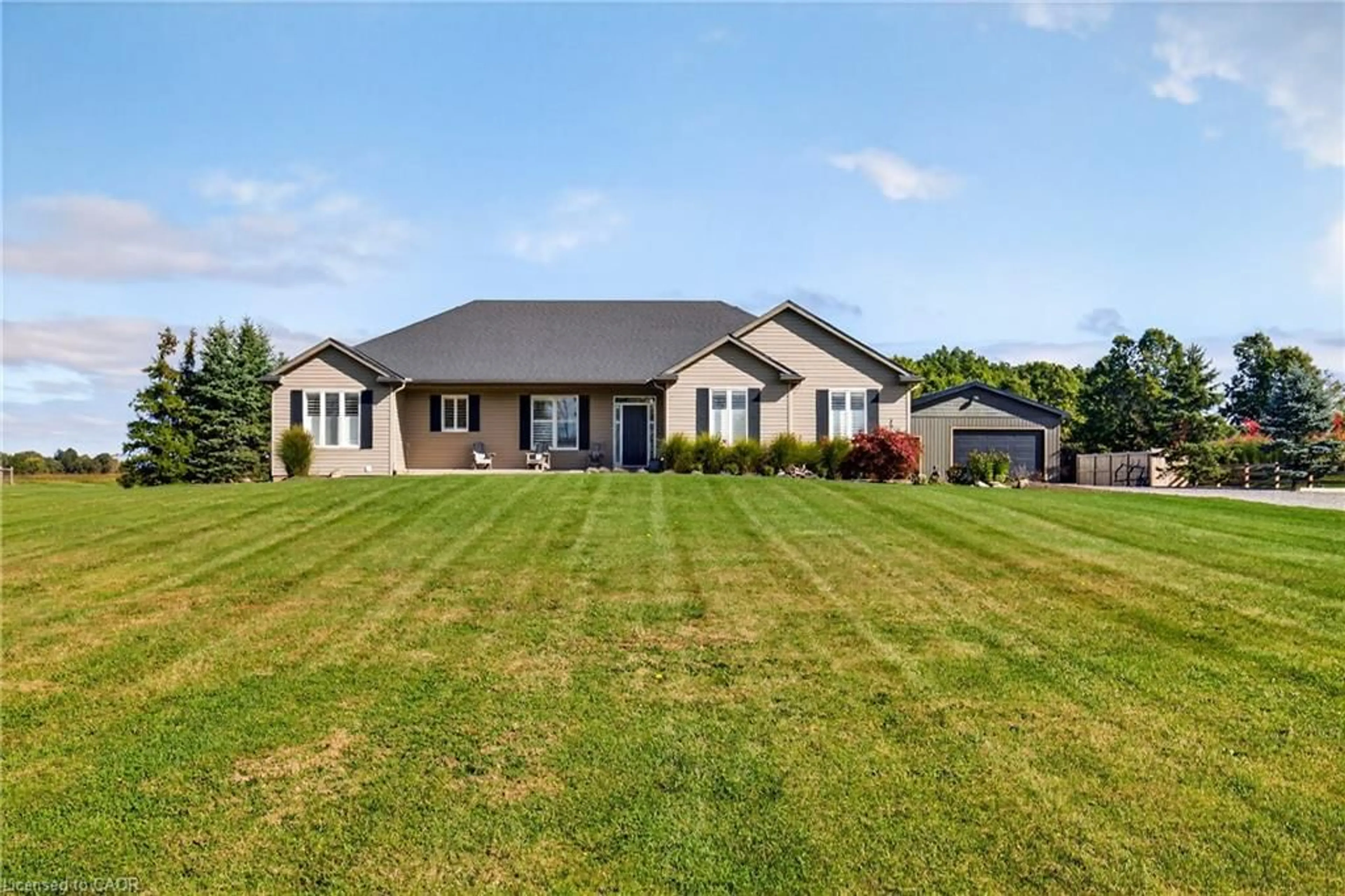 A pic from outside/outdoor area/front of a property/back of a property/a pic from drone, street for 849 River Rd, Fenwick Ontario L0S 1C0
