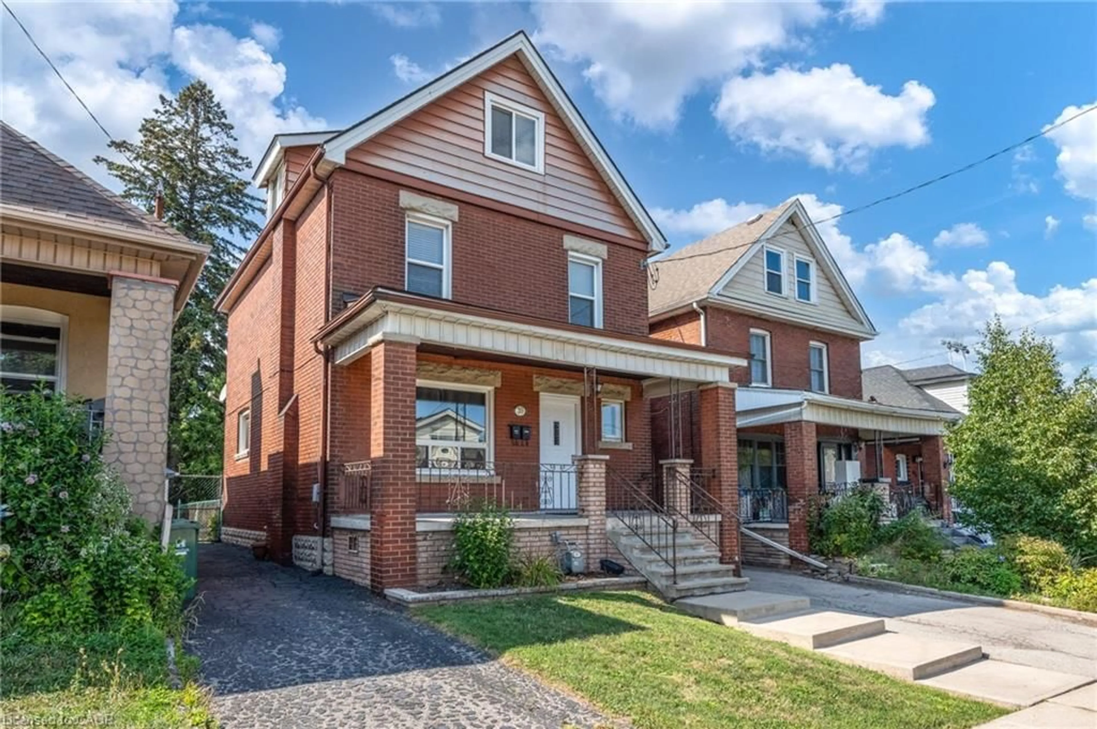Home with brick exterior material, street for 39 Connaught Ave, Hamilton Ontario L8L 6Y6
