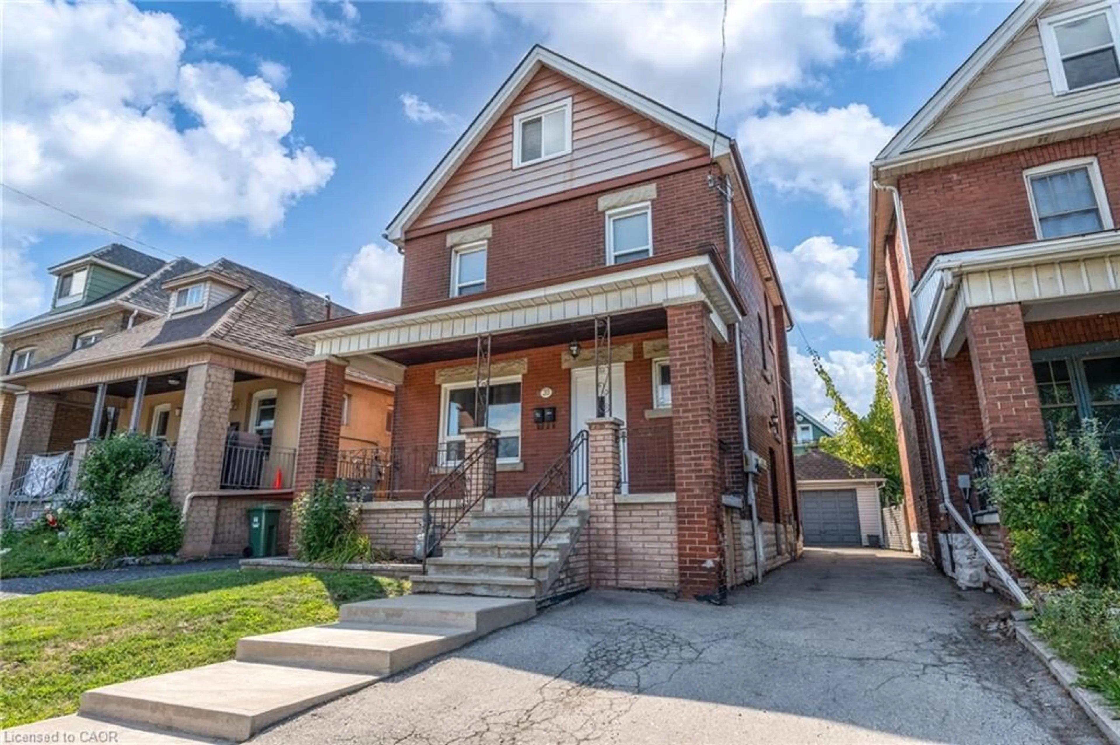Home with brick exterior material, street for 39 Connaught Ave, Hamilton Ontario L8L 6Y6