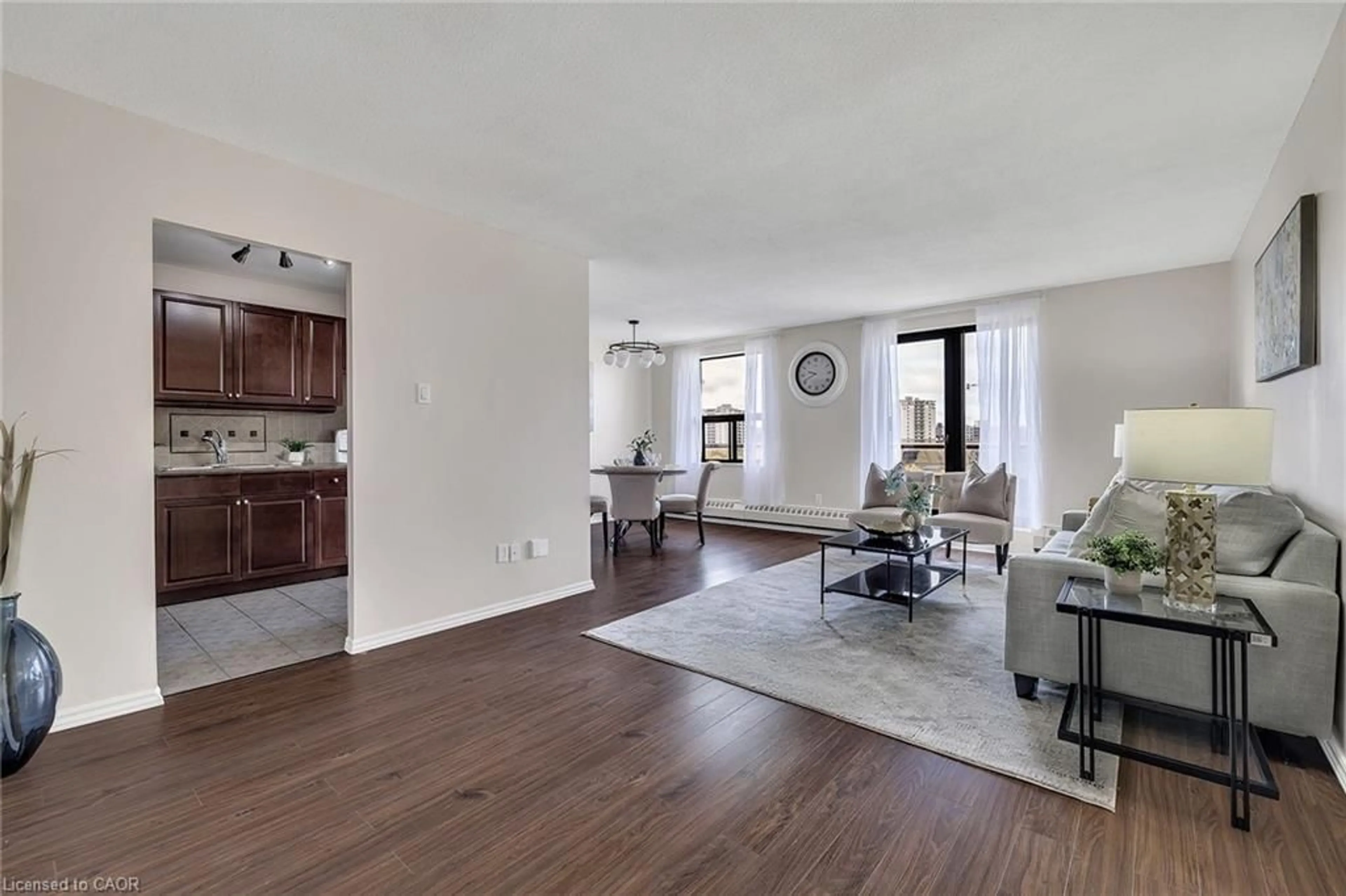 Living room with furniture, unknown for 1100 Courtland Ave #605, Kitchener Ontario N2C 2H9