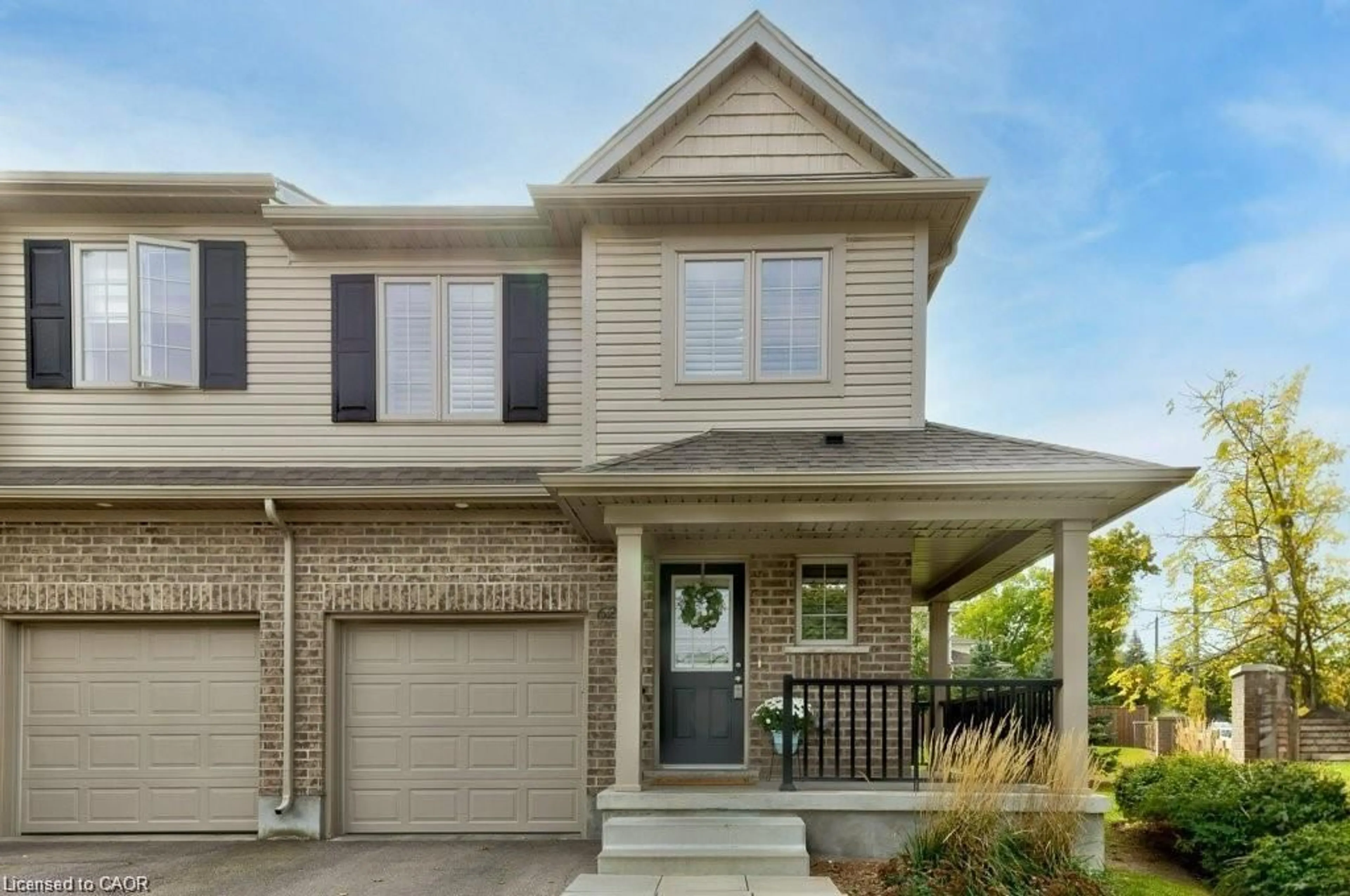 Home with vinyl exterior material, street for 50 Pinnacle Dr #62, Kitchener Ontario N2P 1C5