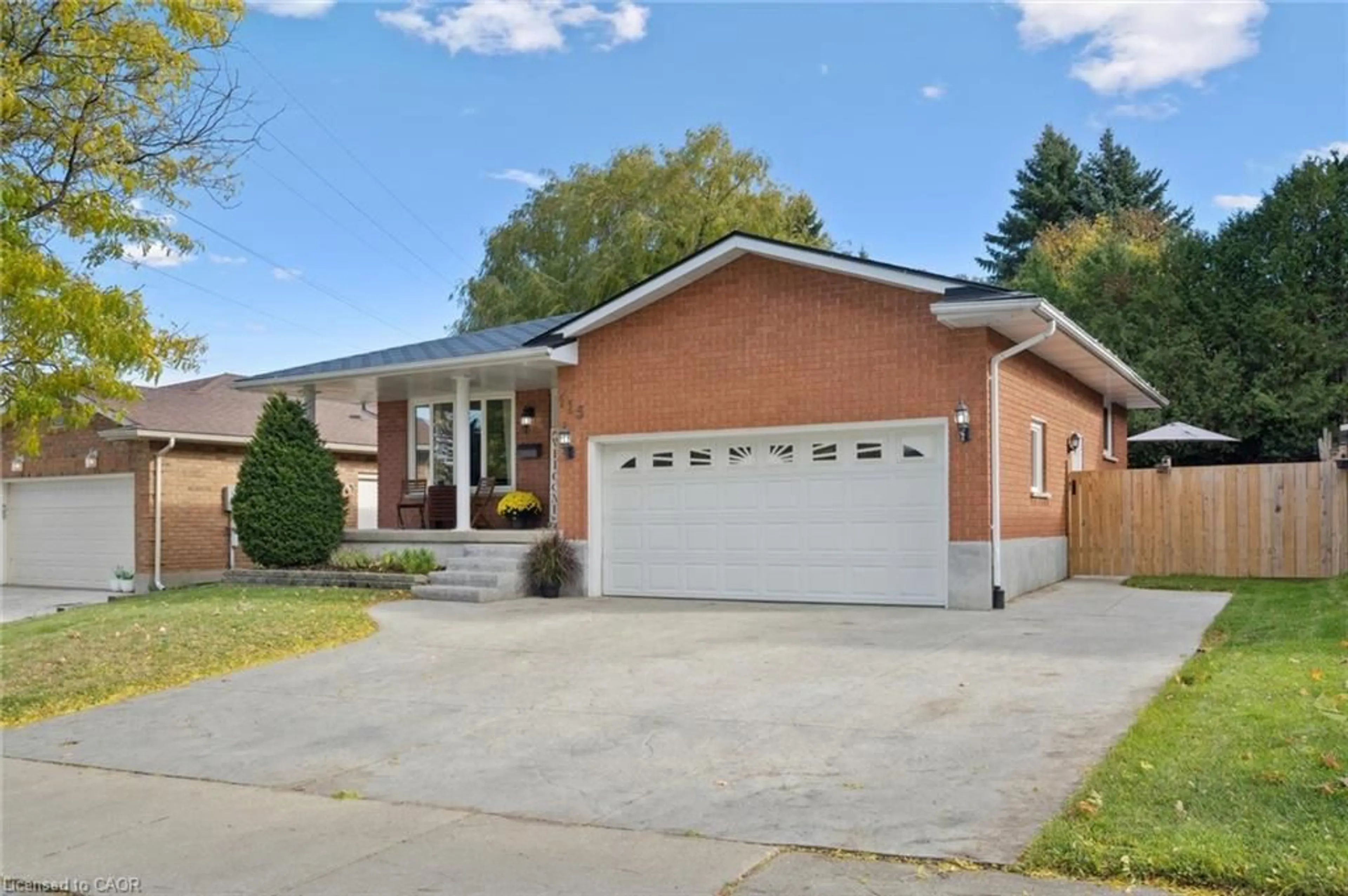 Home with brick exterior material, street for 115 Yellow Birch Dr, Kitchener Ontario N2N 2N3