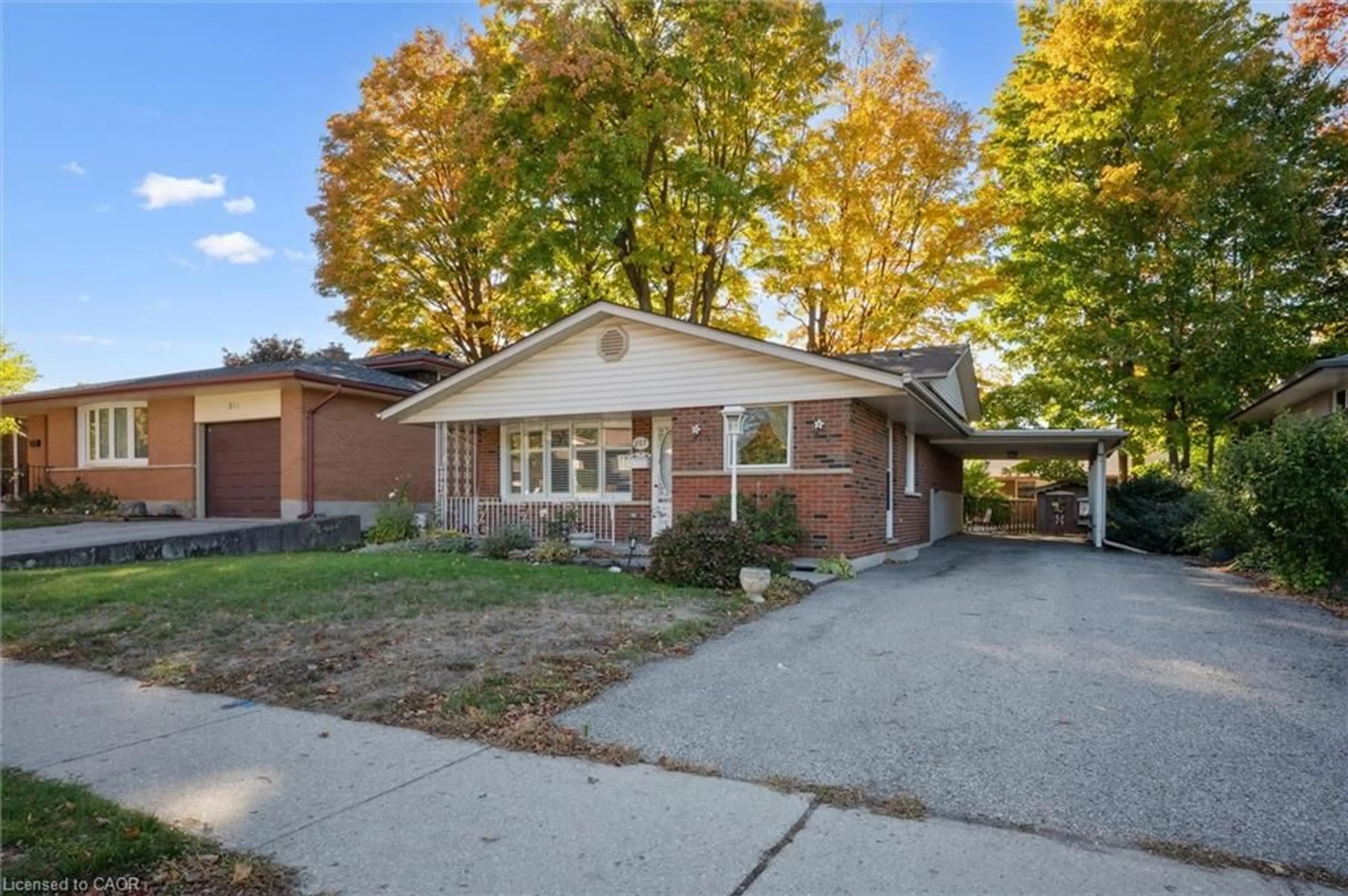 Home with brick exterior material, street for 207 Laurentian Dr, Kitchener Ontario N2E 2G5
