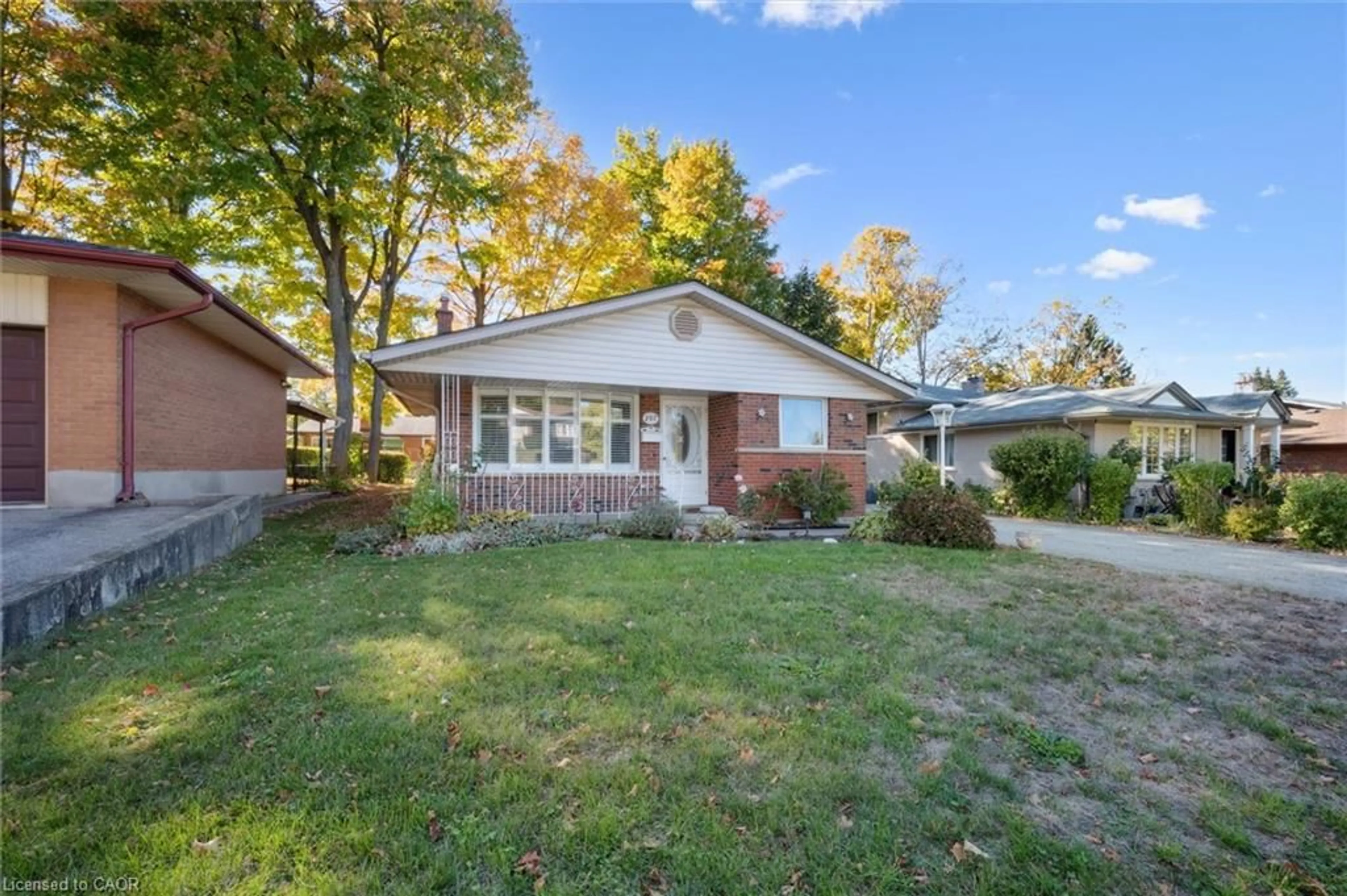 Home with brick exterior material, street for 207 Laurentian Dr, Kitchener Ontario N2E 2G5