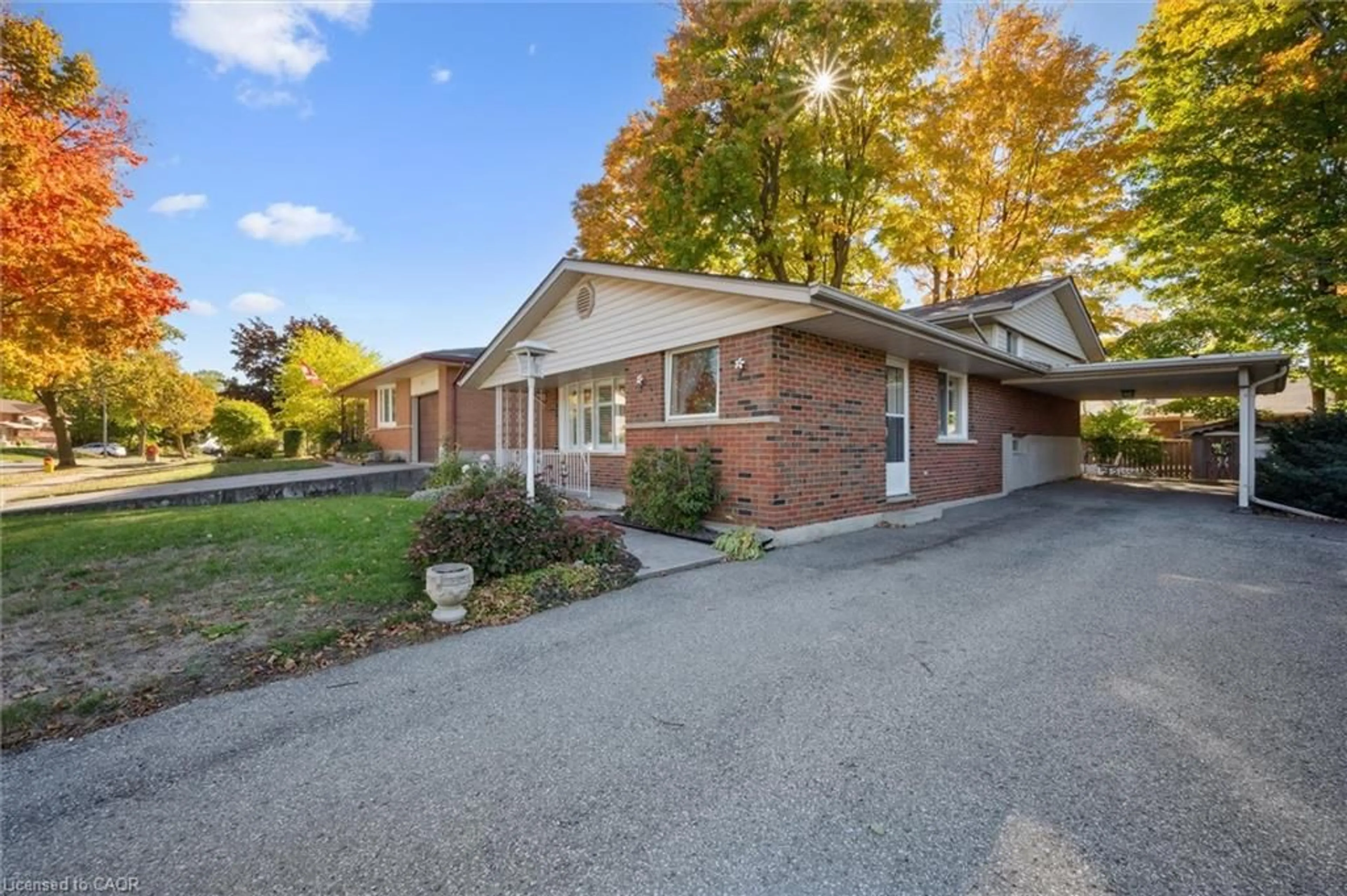 Home with brick exterior material, street for 207 Laurentian Dr, Kitchener Ontario N2E 2G5