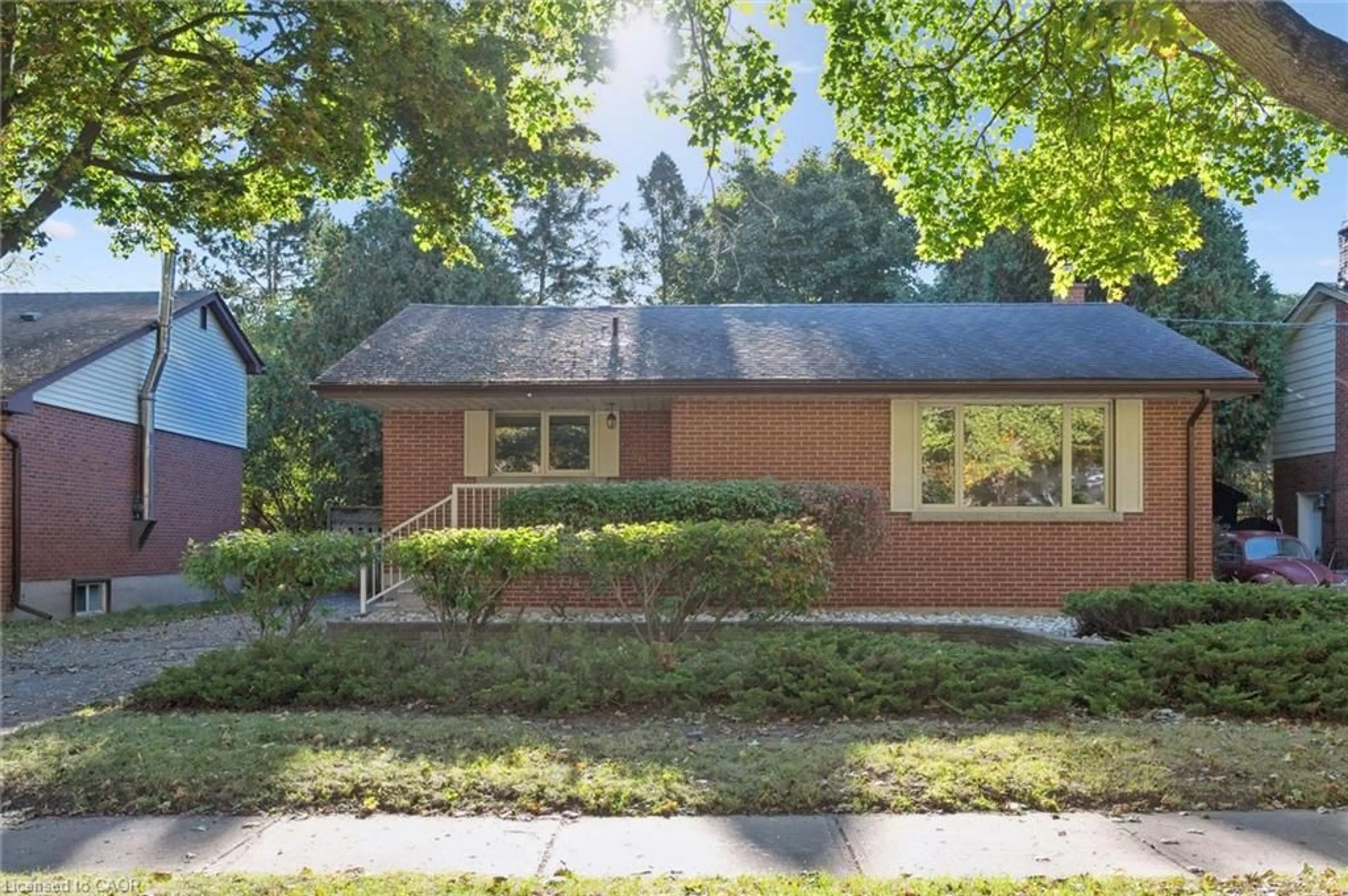 Home with brick exterior material, street for 228 Water St, Guelph Ontario N1G 1B2