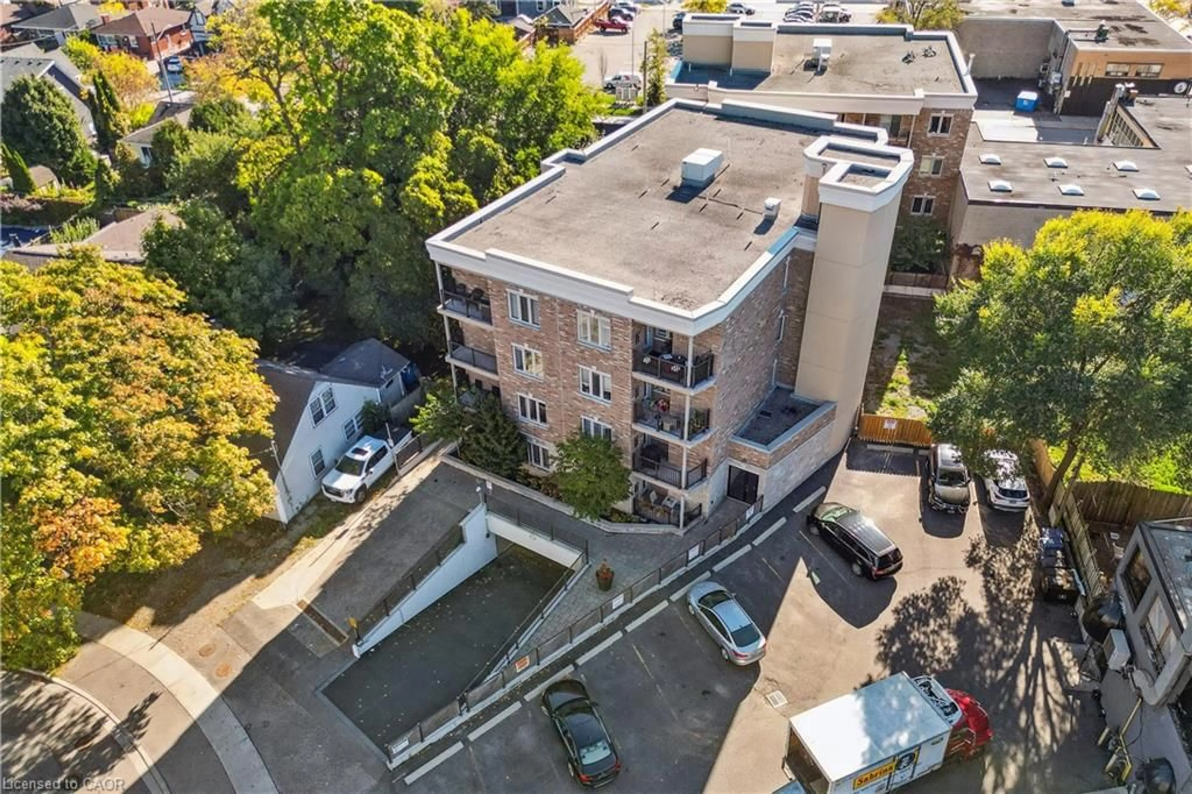A pic from outside/outdoor area/front of a property/back of a property/a pic from drone, city buildings view from balcony for 70 Stewart St #202, Oakville Ontario L6K 1W5