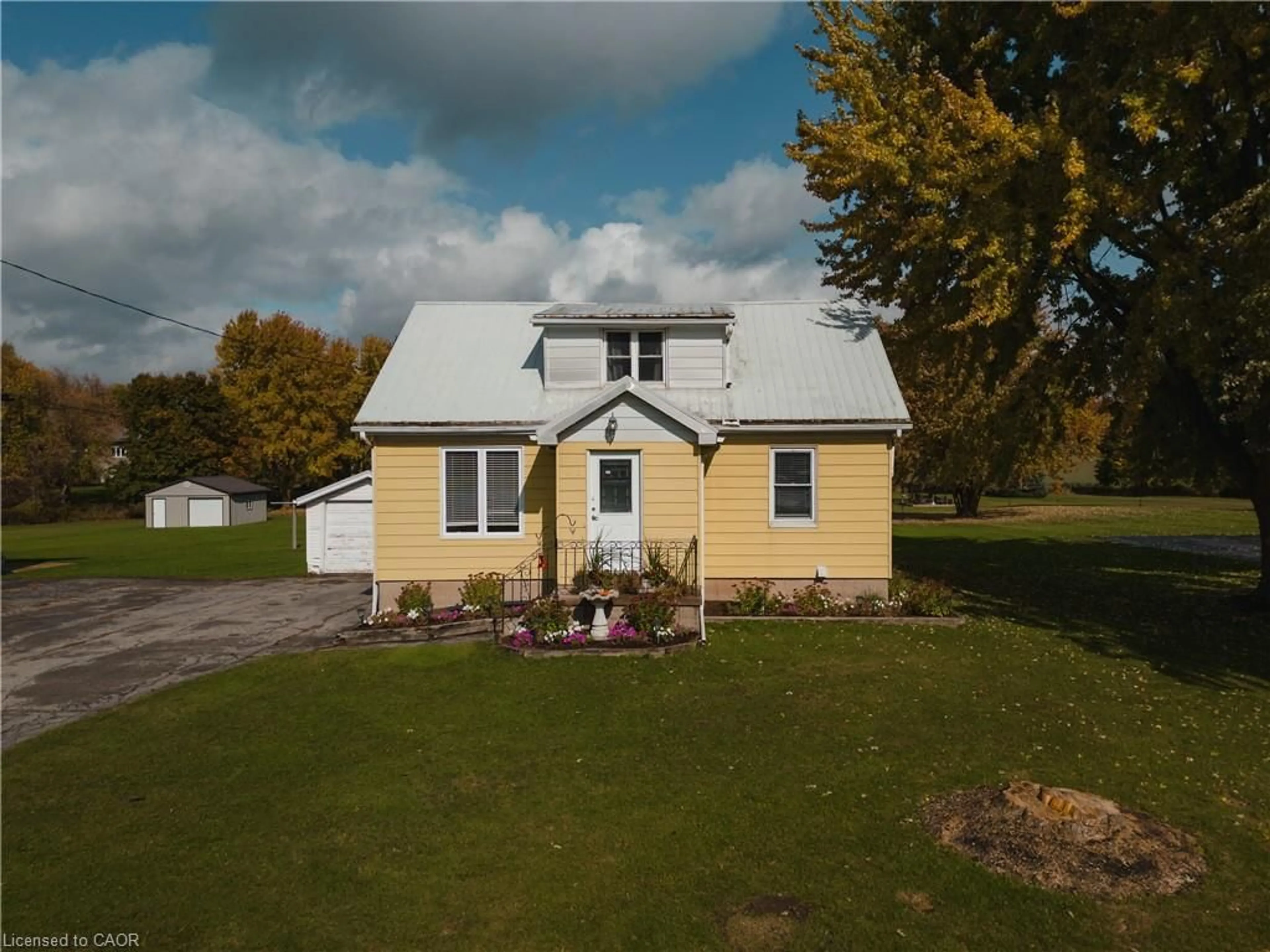 A pic from outside/outdoor area/front of a property/back of a property/a pic from drone, street for 3395 Lobsinger Line, St. Clements Ontario N0B 2M0