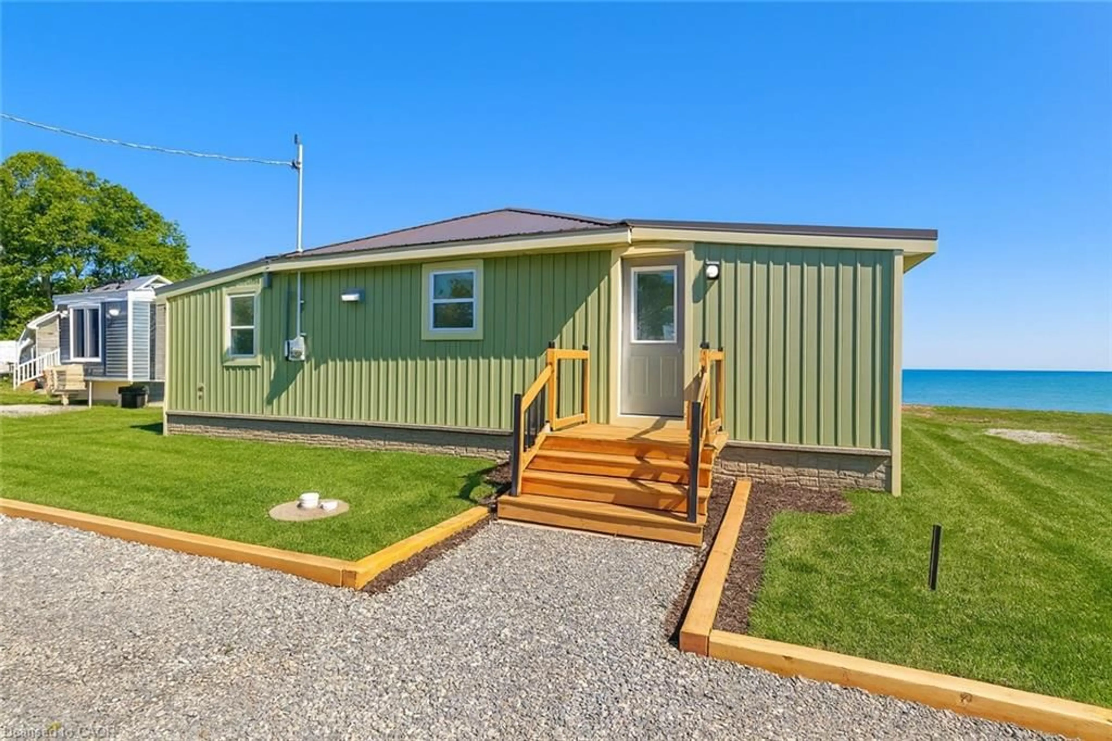 Home with vinyl exterior material, water/lake/river/ocean view for 49 Derner Line, Lowbanks Ontario N0A 1K0