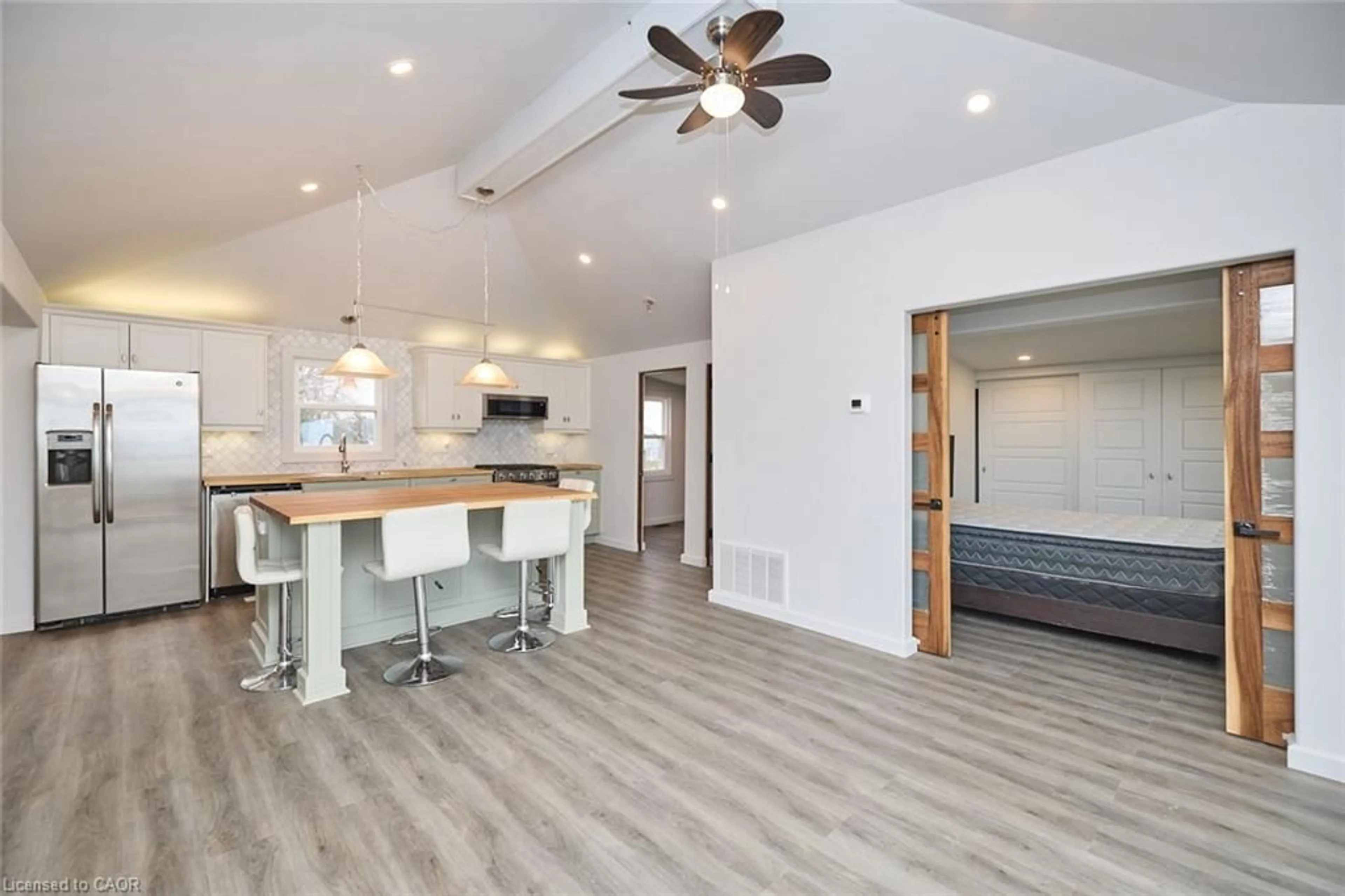 Open concept kitchen, wood/laminate floor for 49 Derner Line, Lowbanks Ontario N0A 1K0