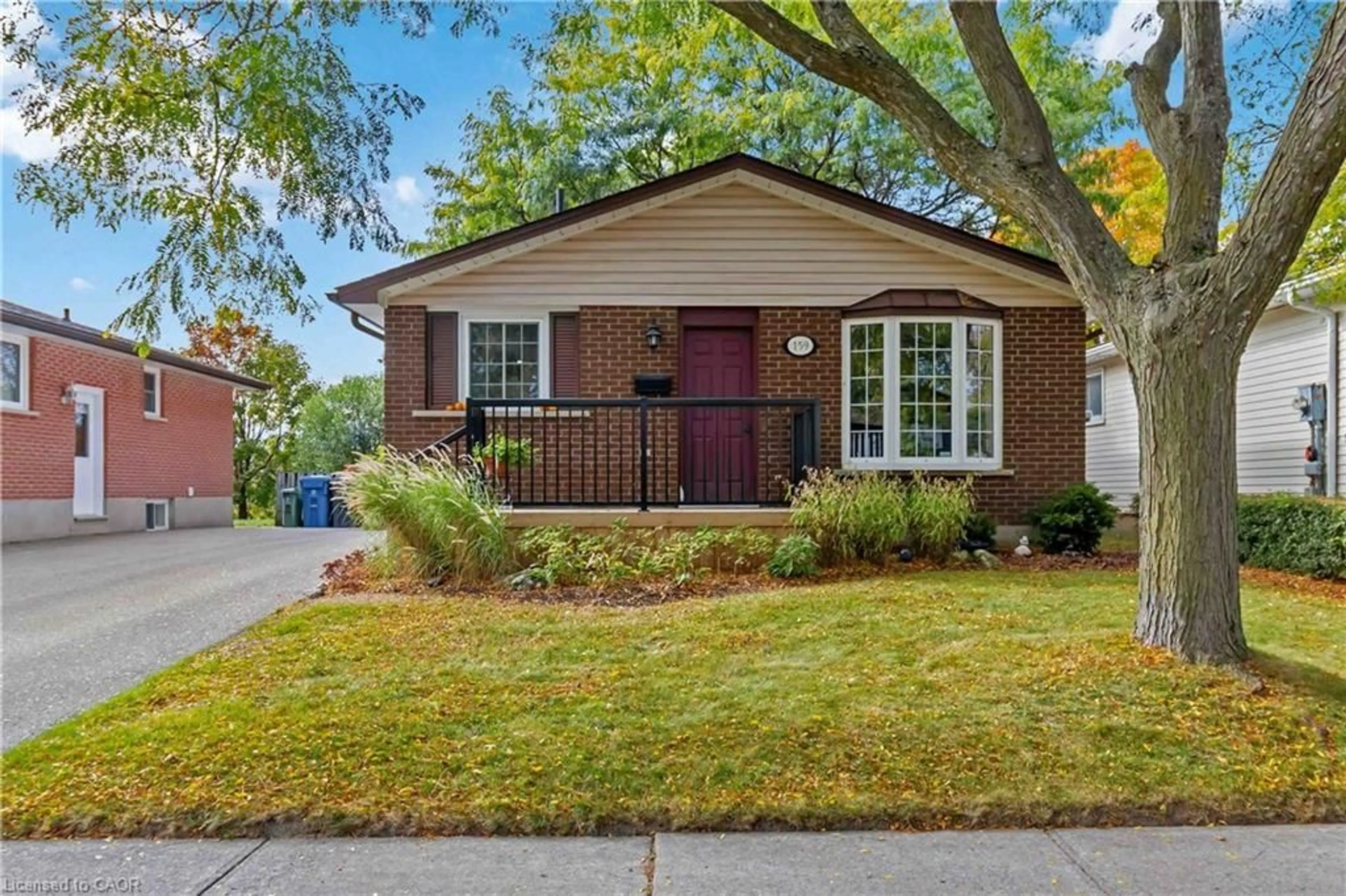 Home with brick exterior material, street for 159 Hadati Rd, Guelph Ontario N1E 6N3
