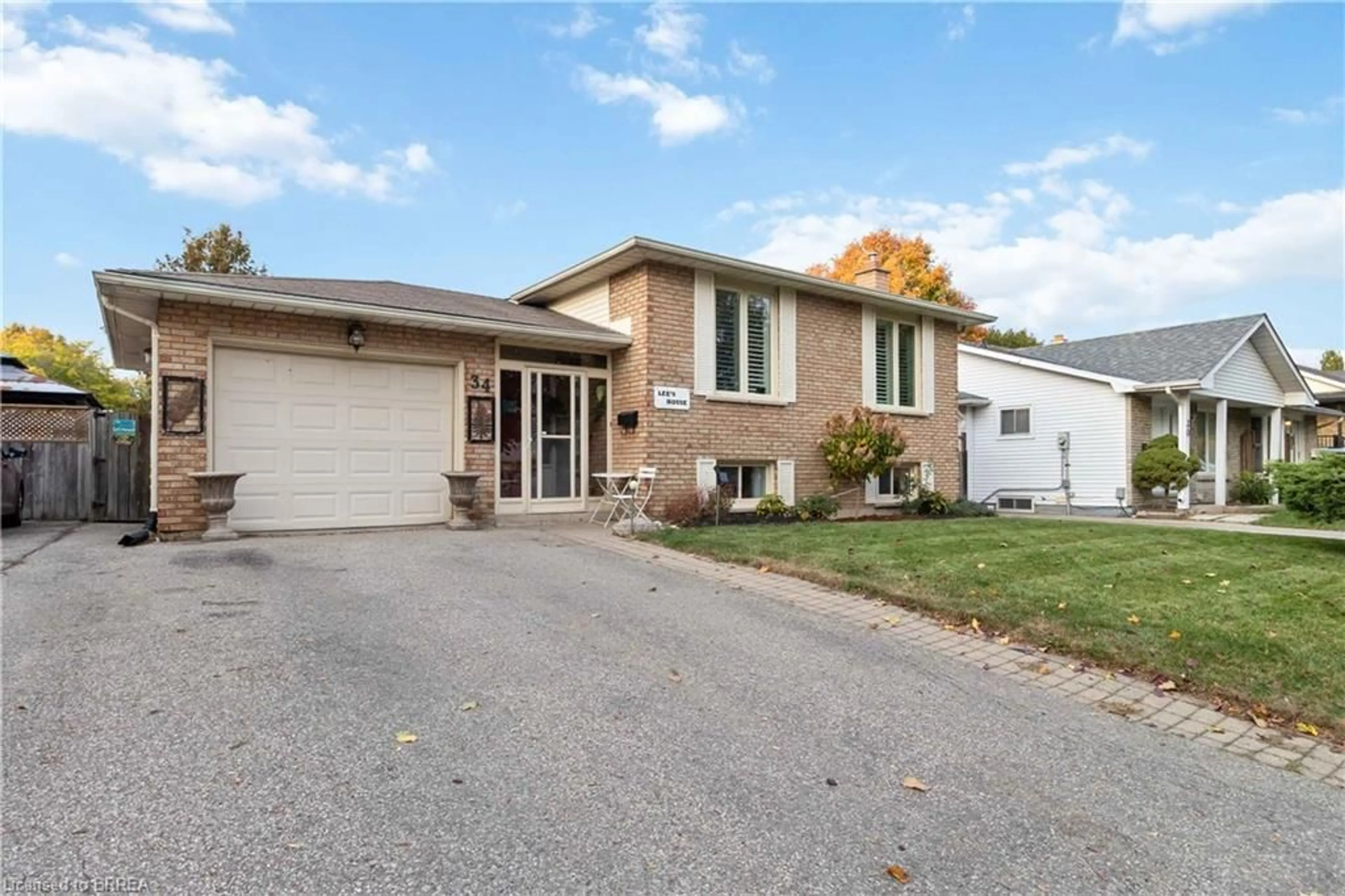 Home with brick exterior material, street for 34 Sympatica Cres, Brantford Ontario N3P 1G4
