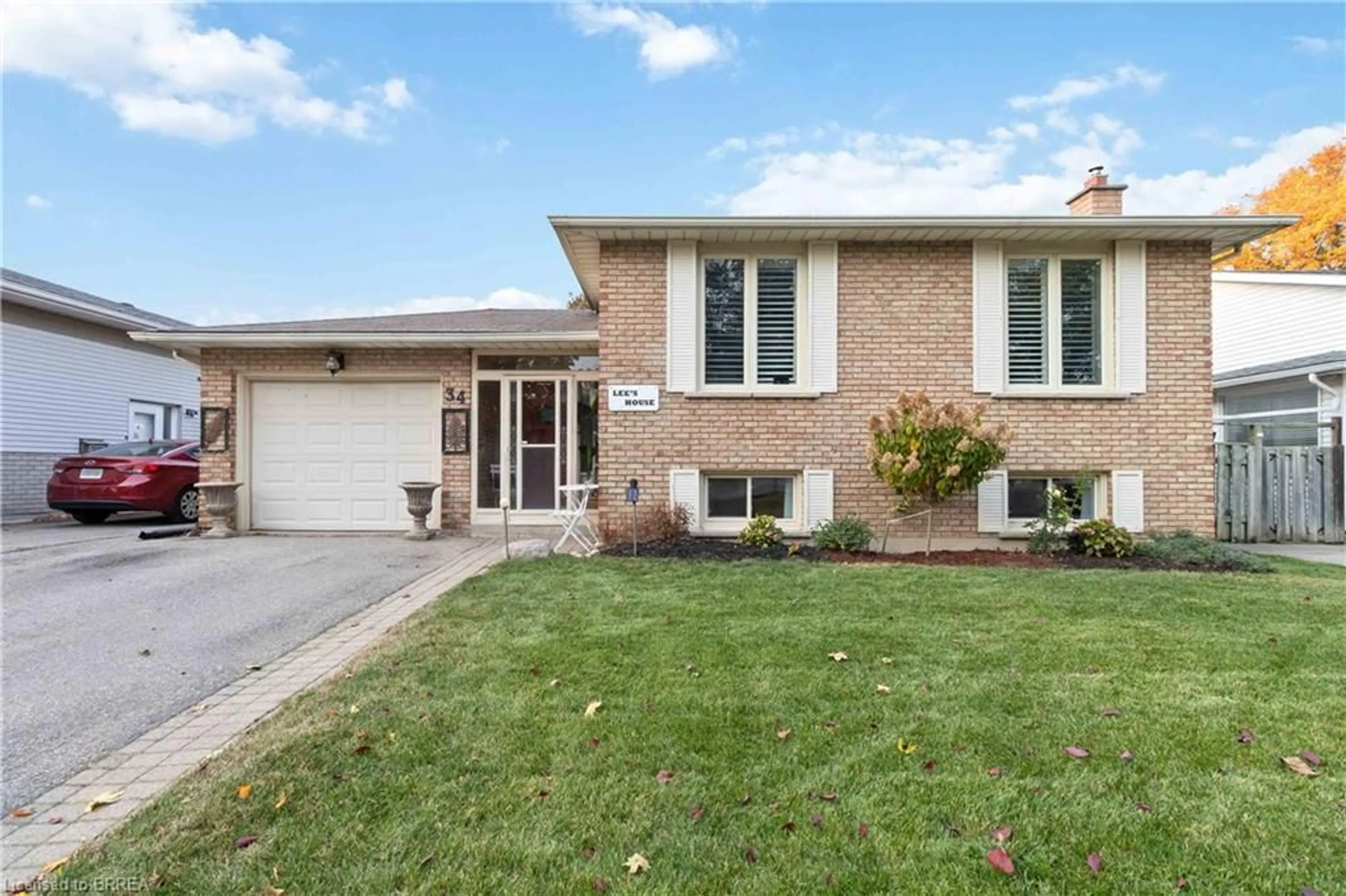 Home with brick exterior material, street for 34 Sympatica Cres, Brantford Ontario N3P 1G4