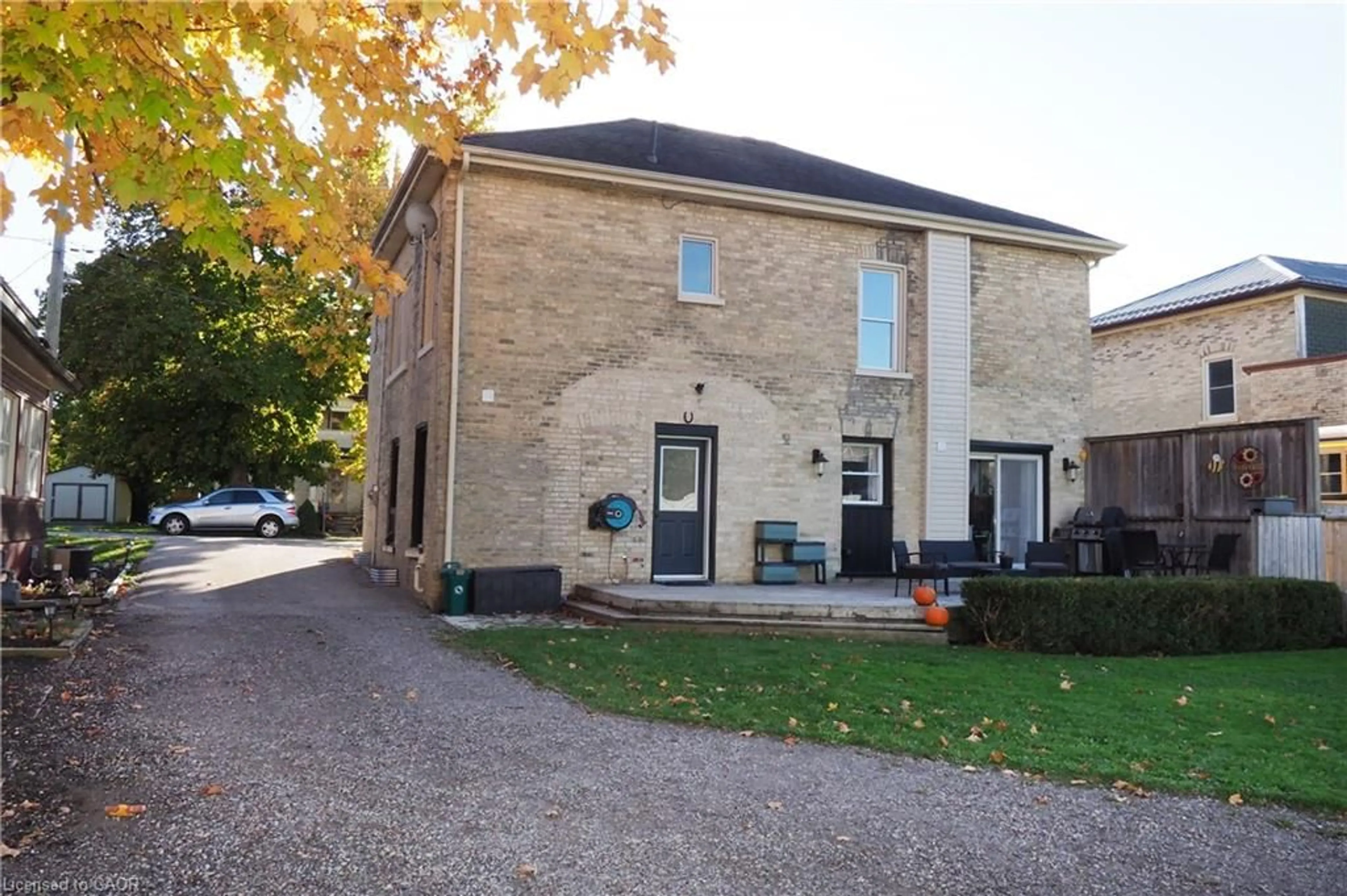 A pic from outside/outdoor area/front of a property/back of a property/a pic from drone, street for 26 Main St, Drayton Ontario N0G 1P0