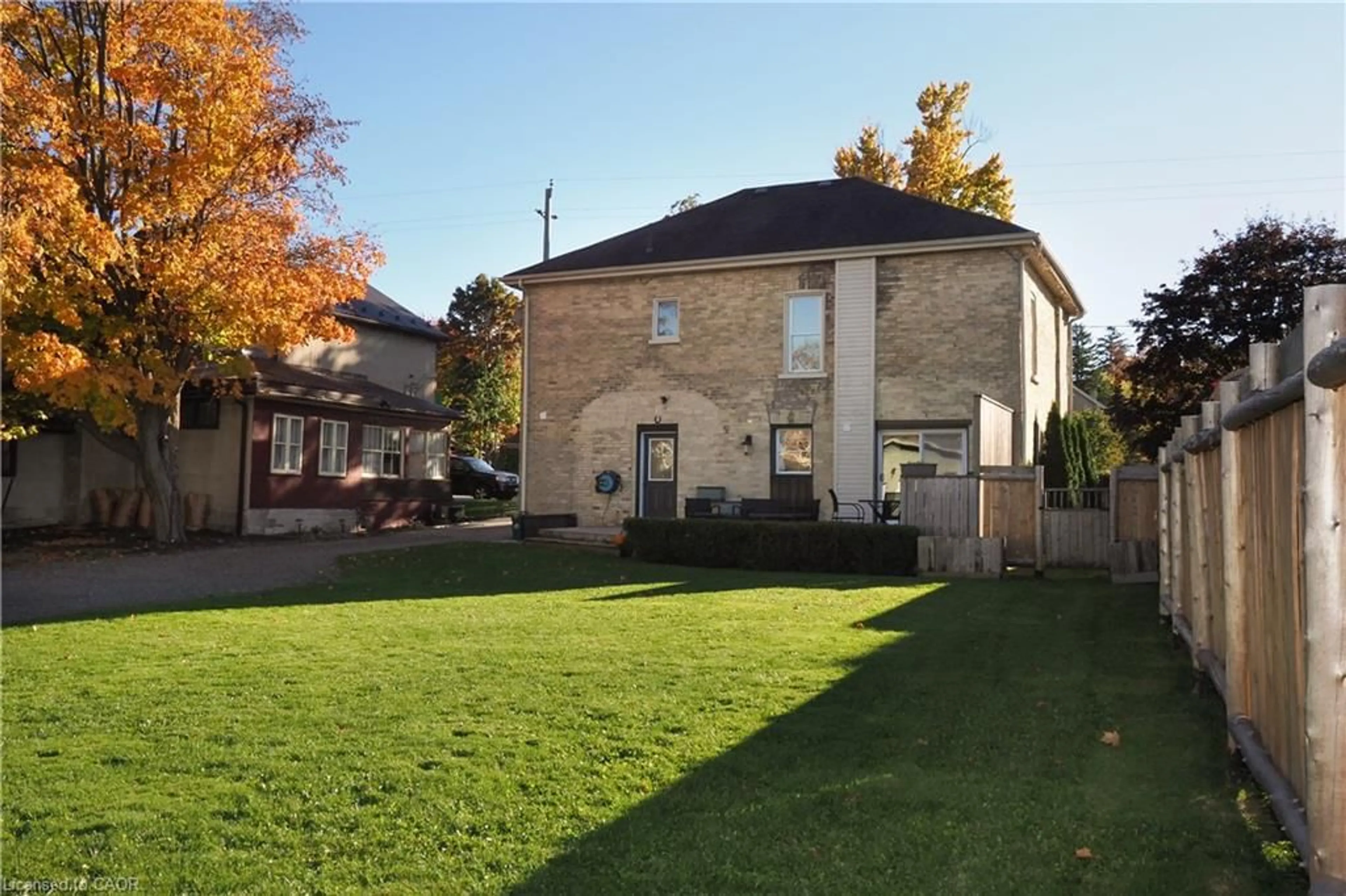A pic from outside/outdoor area/front of a property/back of a property/a pic from drone, unknown for 26 Main St, Drayton Ontario N0G 1P0