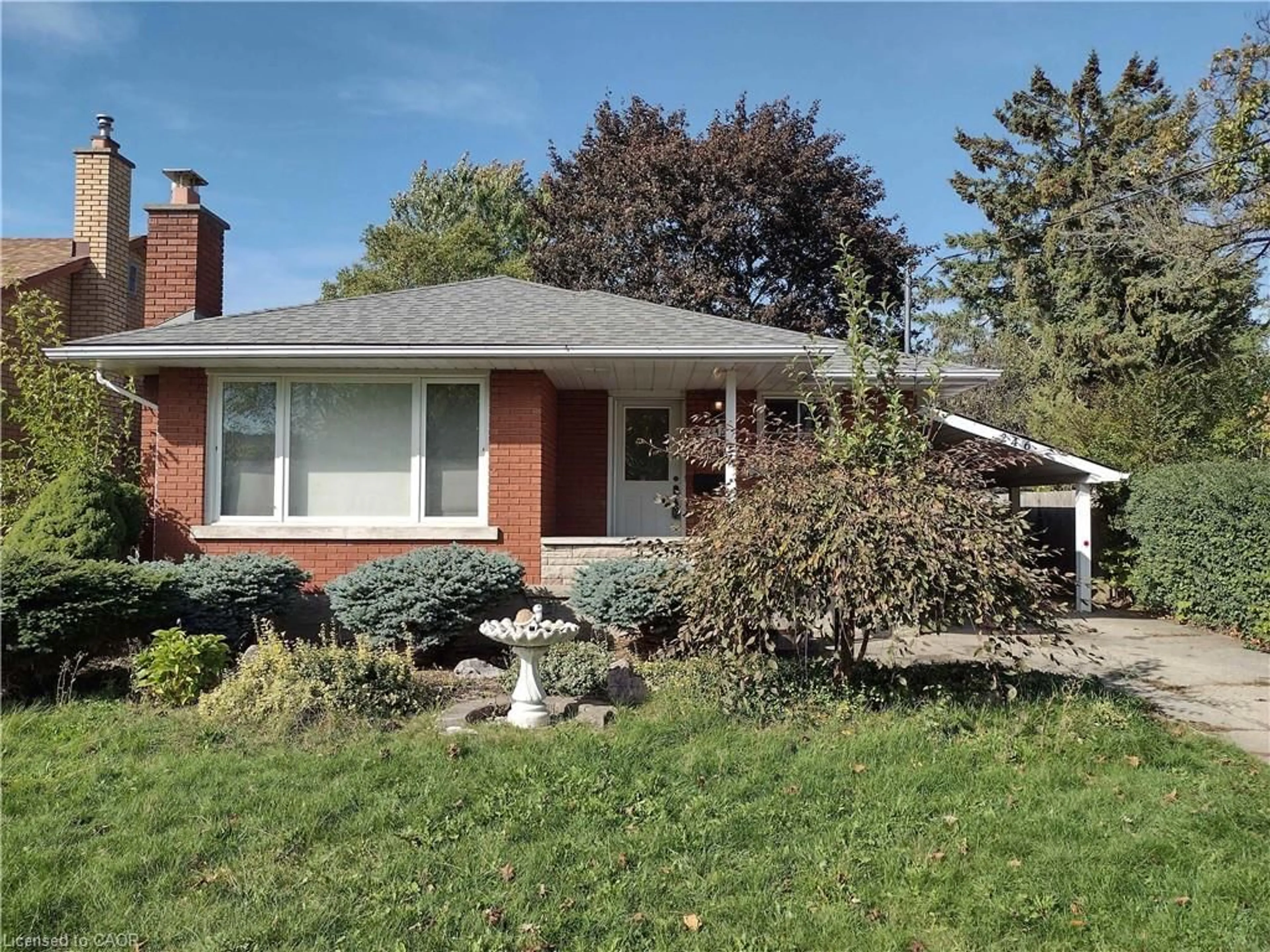 Home with brick exterior material, street for 246 Eighth Ave, Kitchener Ontario N2C 1S7