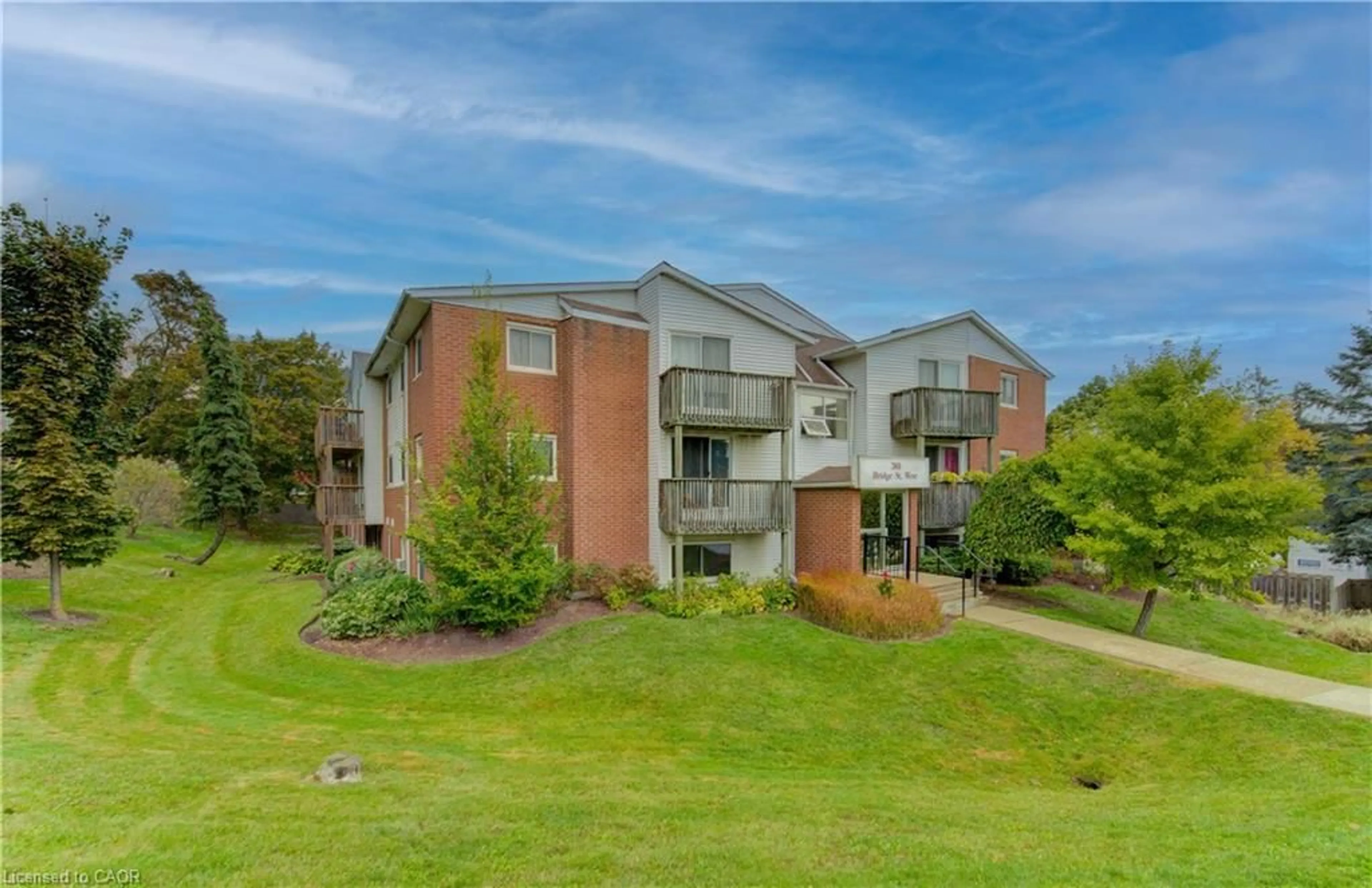 A pic from outside/outdoor area/front of a property/back of a property/a pic from drone, water/lake/river/ocean view for 30 Bridge St #104, Kitchener Ontario N2K 1K4