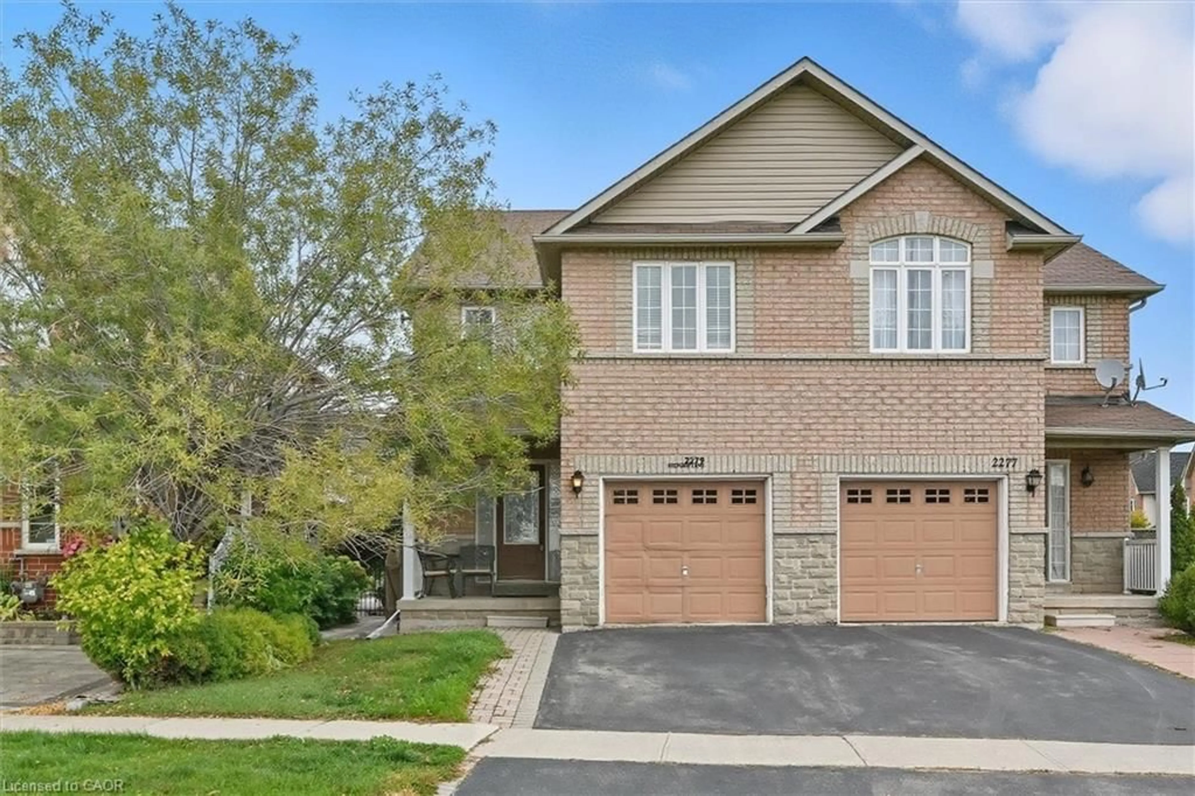 Home with brick exterior material, street for 2279 Milford Lane, Oakville Ontario L6H 7K7