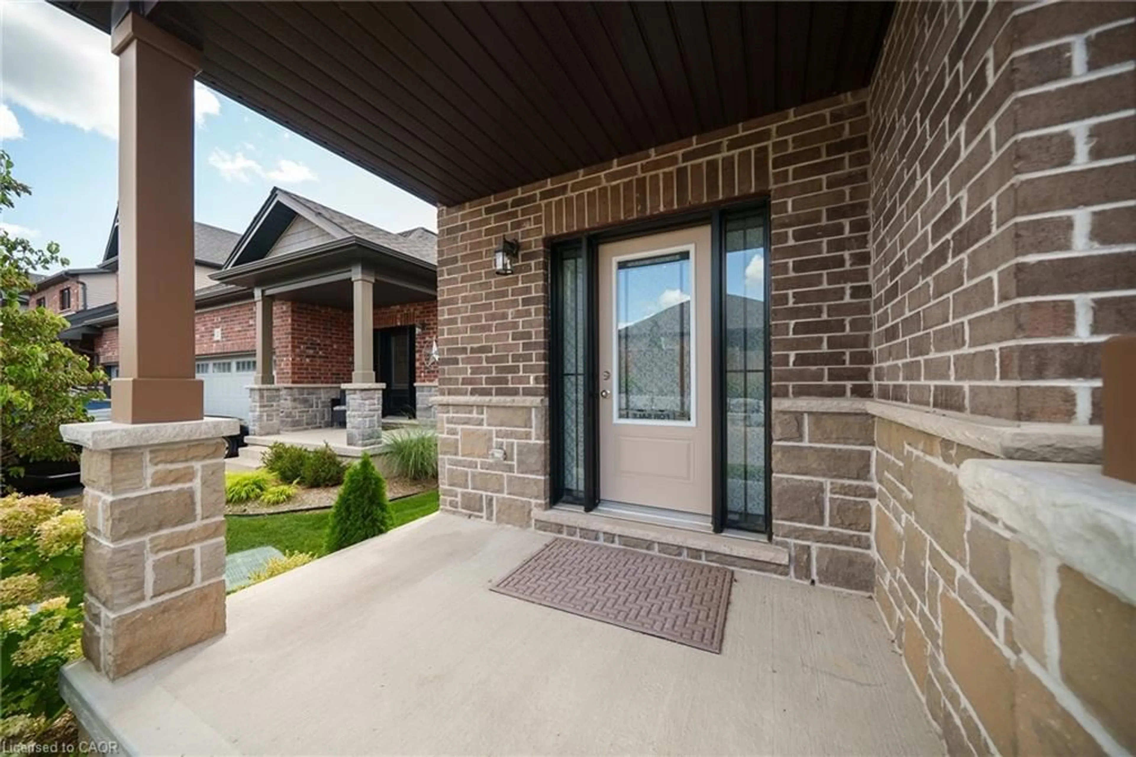Home with brick exterior material, street for 14 Tamarack Way, Simcoe Ontario N3Y 0E5