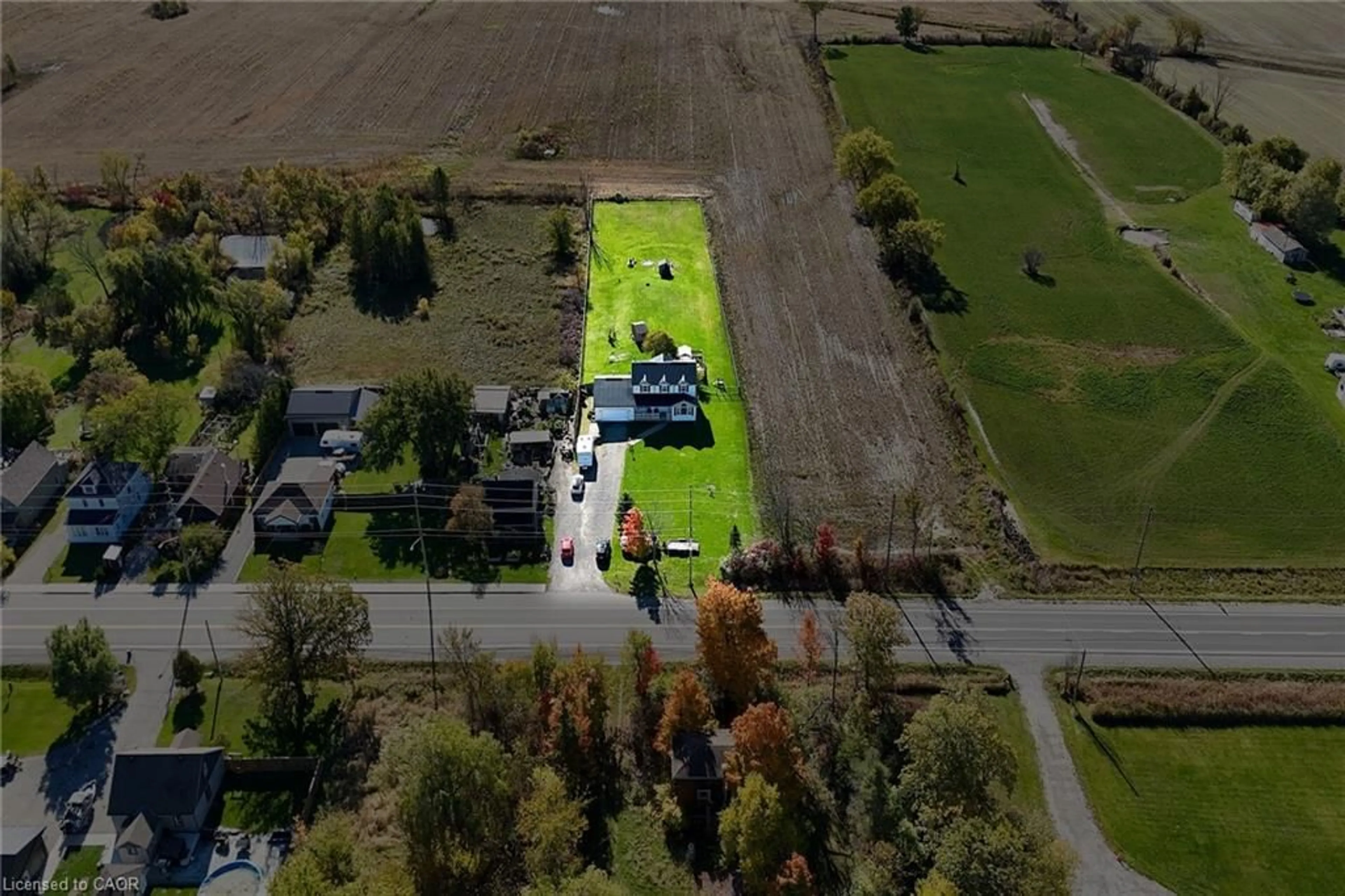 A pic from outside/outdoor area/front of a property/back of a property/a pic from drone, street for 8 Talbot Rd, Canfield Ontario N0A 1C0