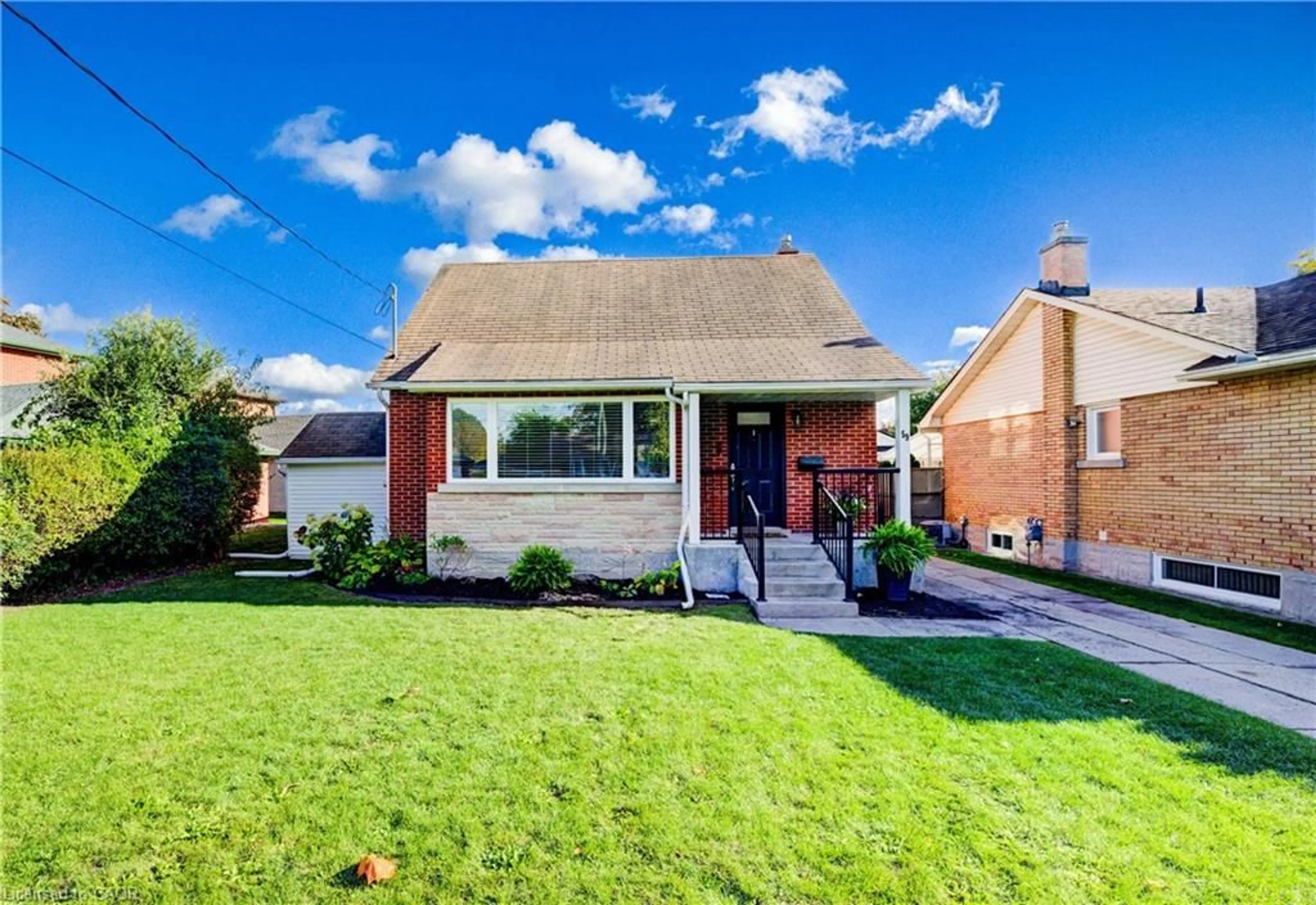 Home with brick exterior material, street for 59 Edinburgh Rd, Kitchener Ontario N2B 1M4