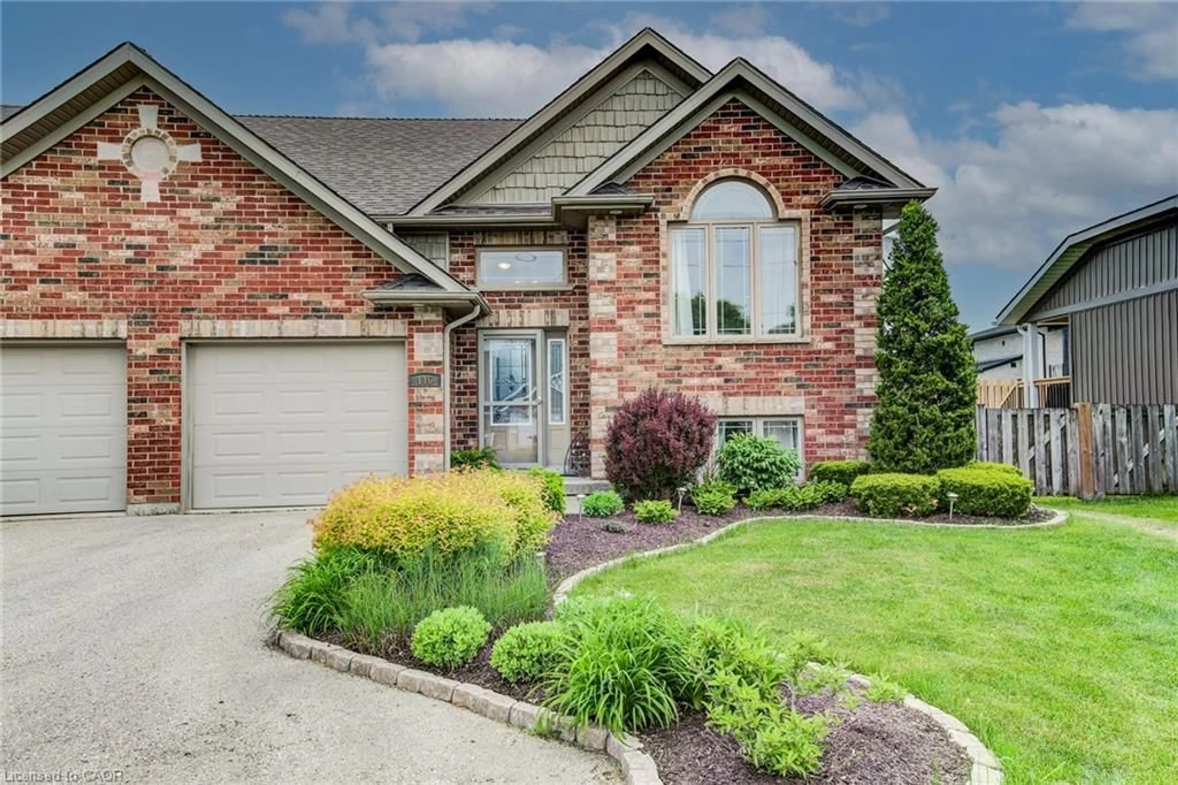 Home with brick exterior material, street for 116 Church St, Mount Forest Ontario N0G 2L2