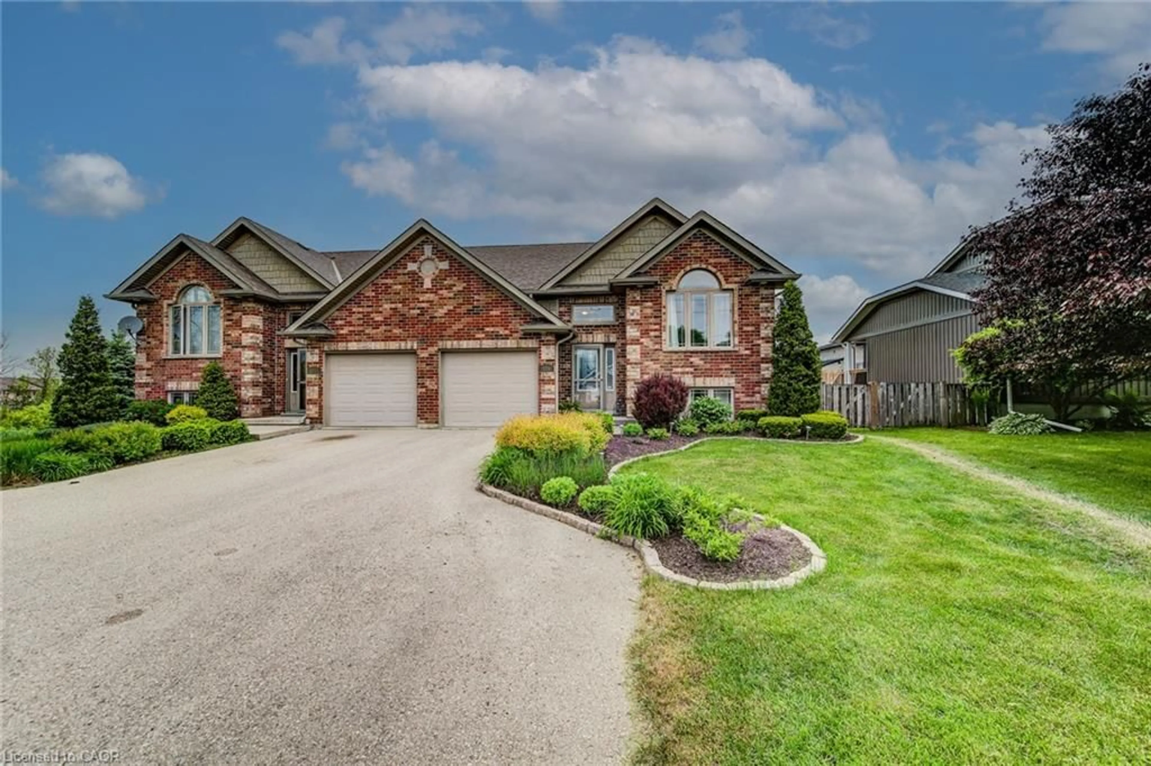 Home with brick exterior material, street for 116 Church St, Mount Forest Ontario N0G 2L2