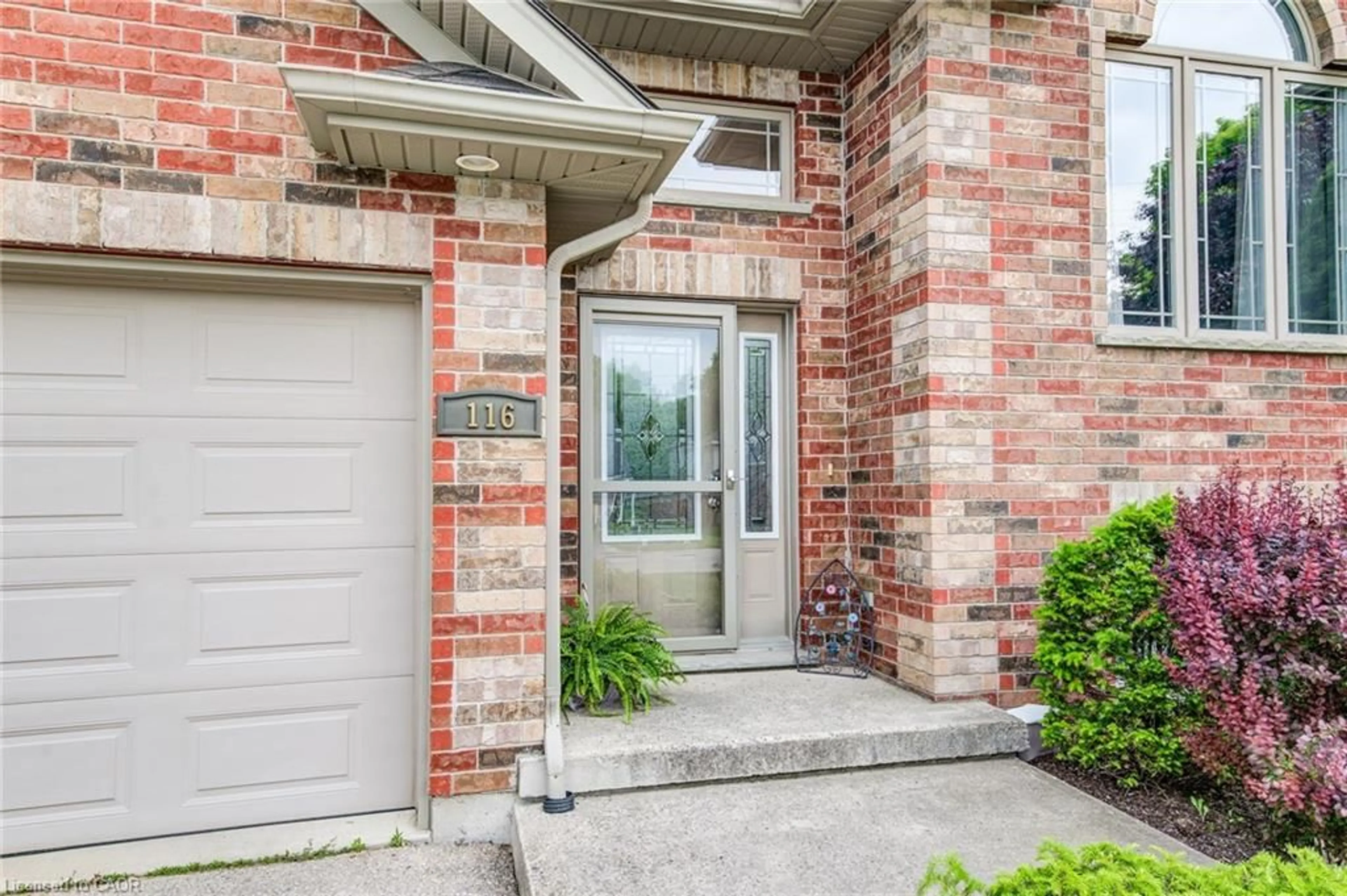 Home with brick exterior material, street for 116 Church St, Mount Forest Ontario N0G 2L2