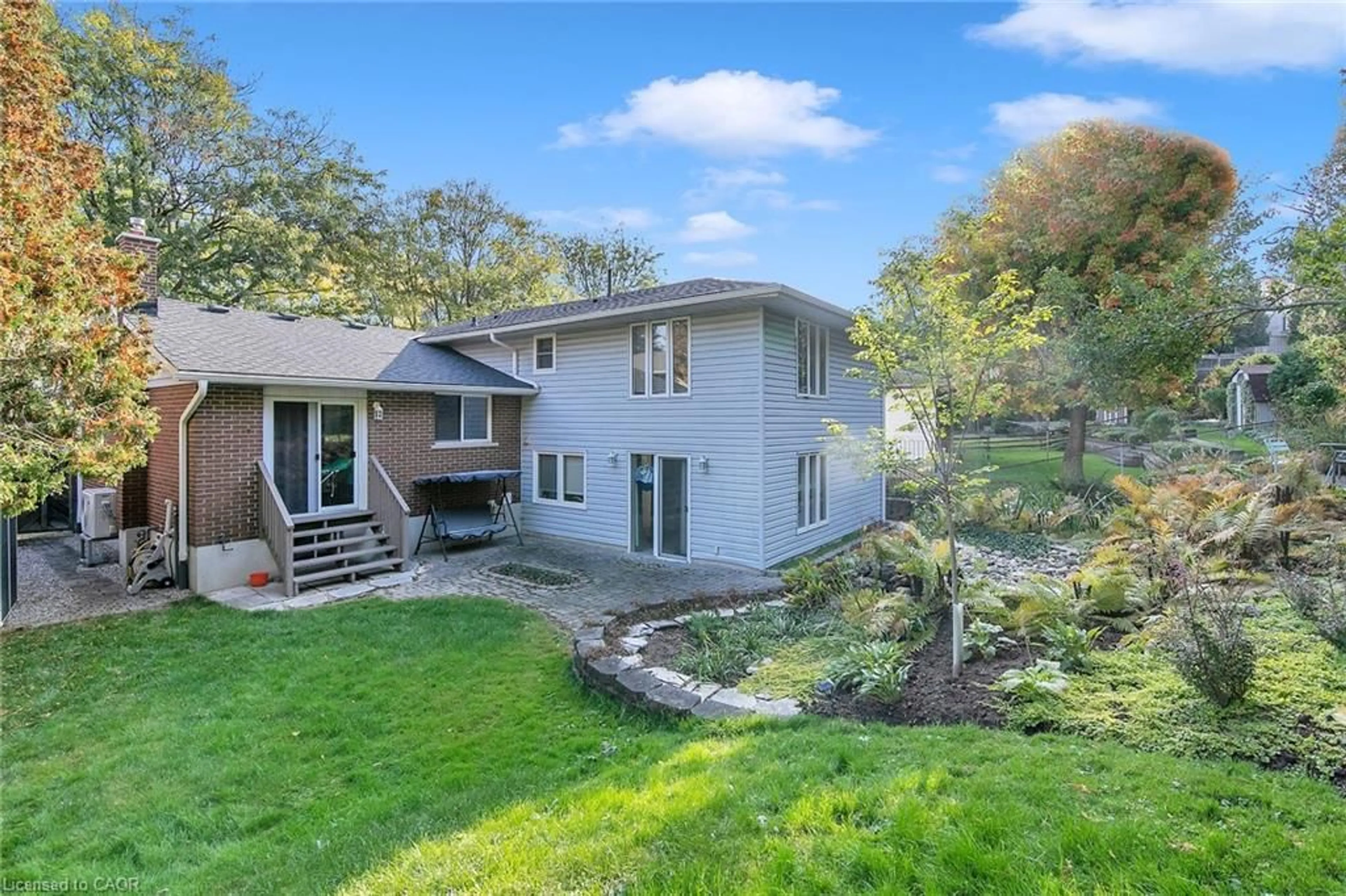 A pic from outside/outdoor area/front of a property/back of a property/a pic from drone, water/lake/river/ocean view for 22 Thistle Rd, Guelph Ontario N1H 6S8