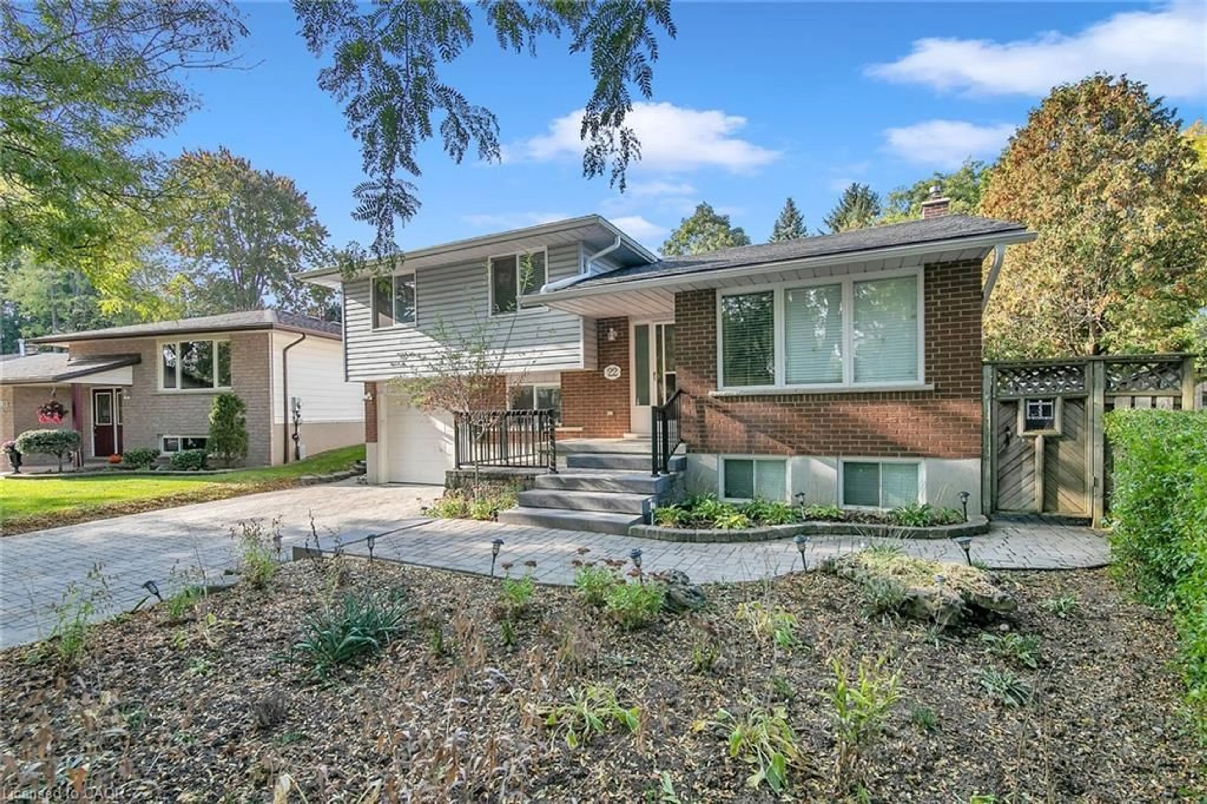 Home with brick exterior material, street for 22 Thistle Rd, Guelph Ontario N1H 6S8