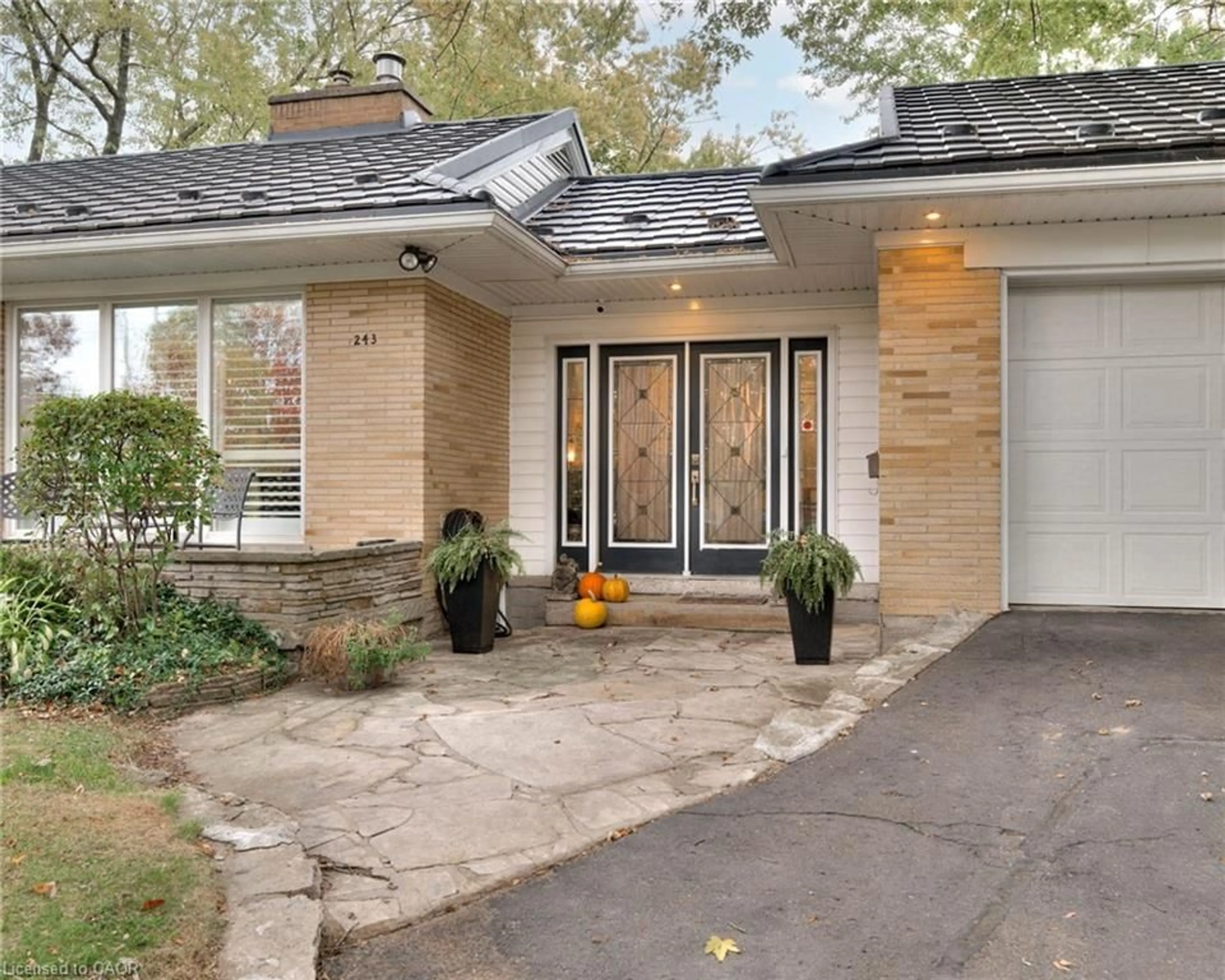 Home with brick exterior material, street for 243 Lincoln Rd, Waterloo Ontario N2J 2P4