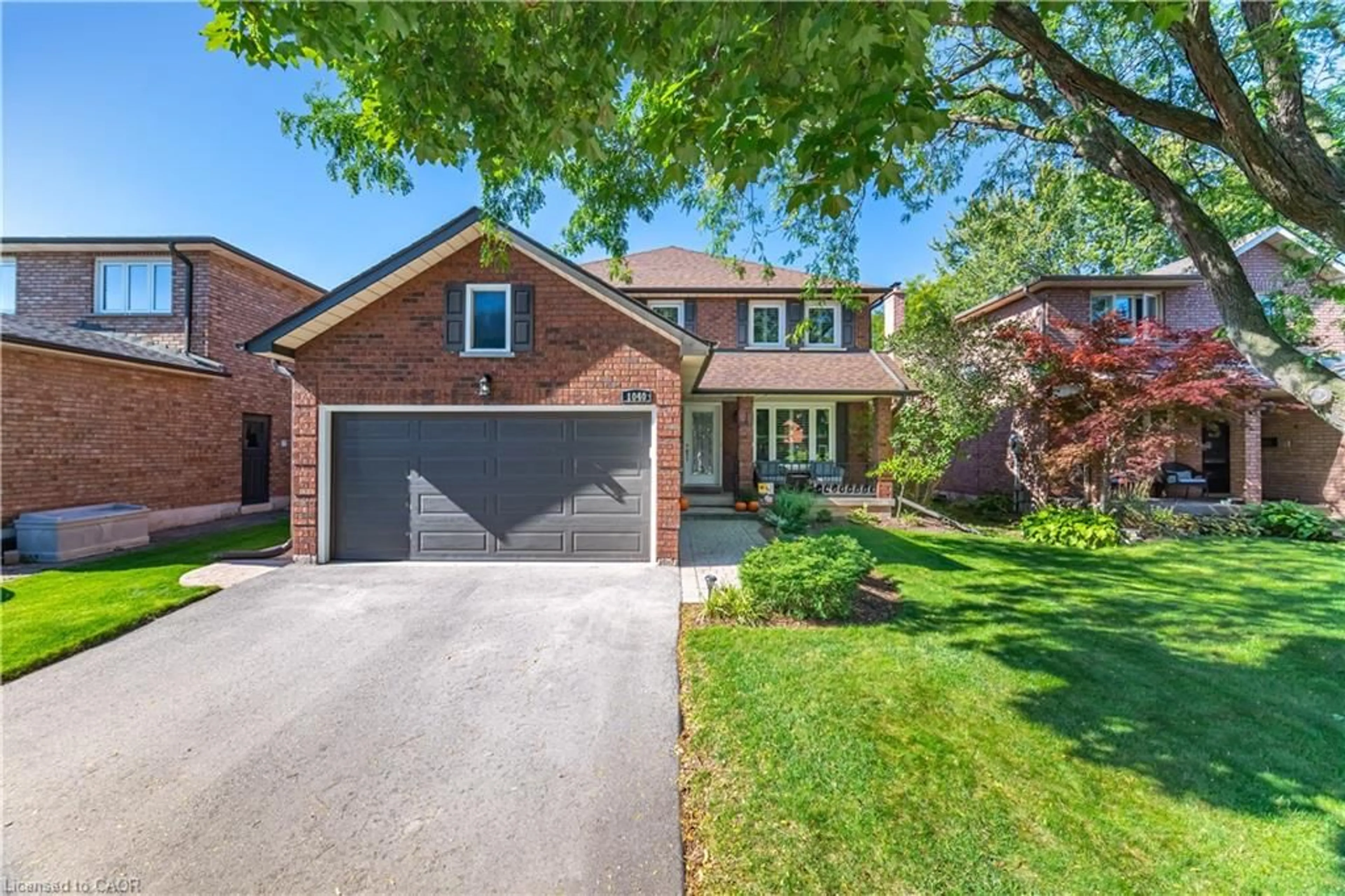 Home with brick exterior material, street for 1040 Manchester Cres, Oakville Ontario L6M 1G2