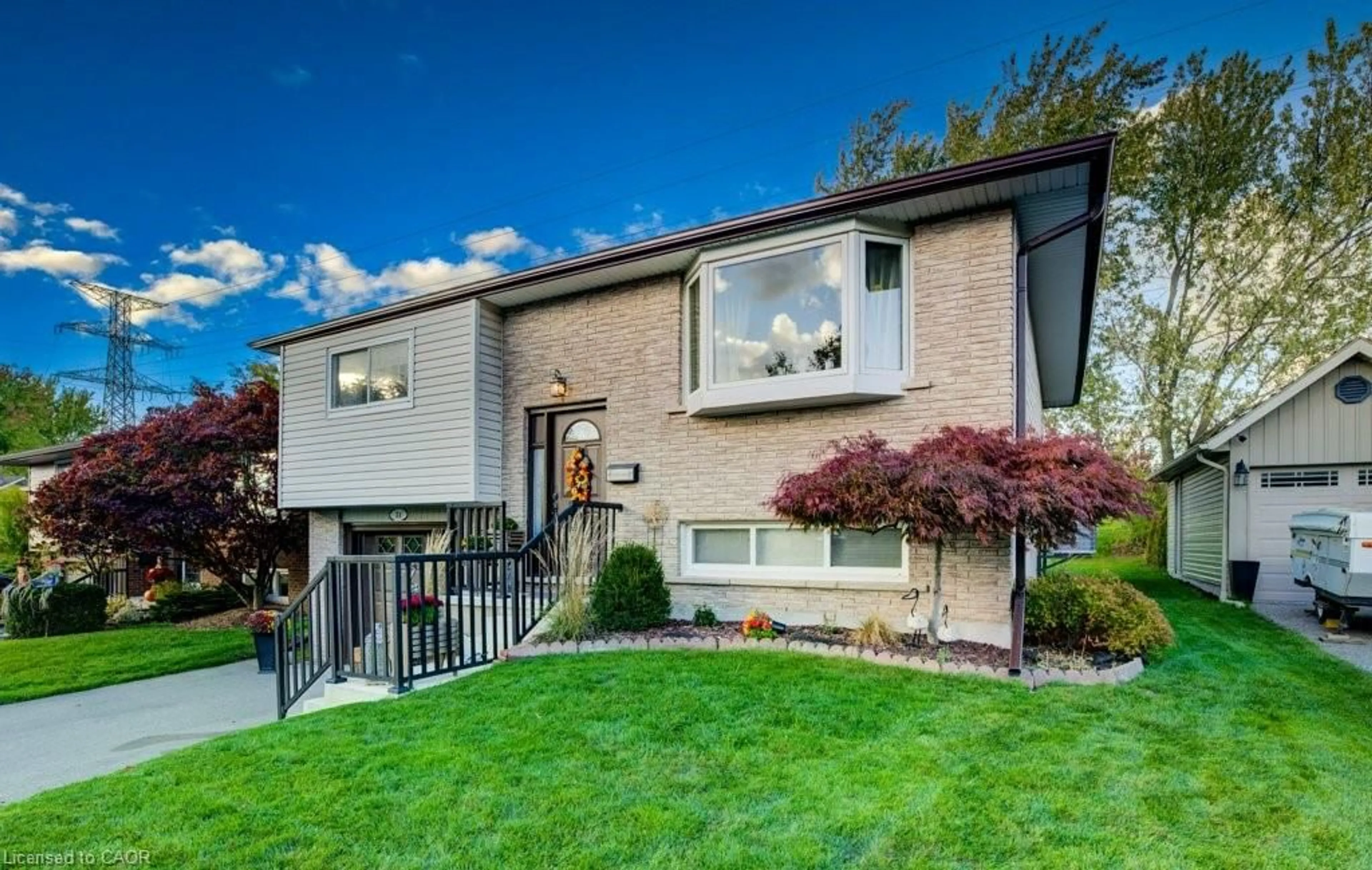 Home with brick exterior material, street for 34 Willow Green Crt, Kitchener Ontario N2N 1W6