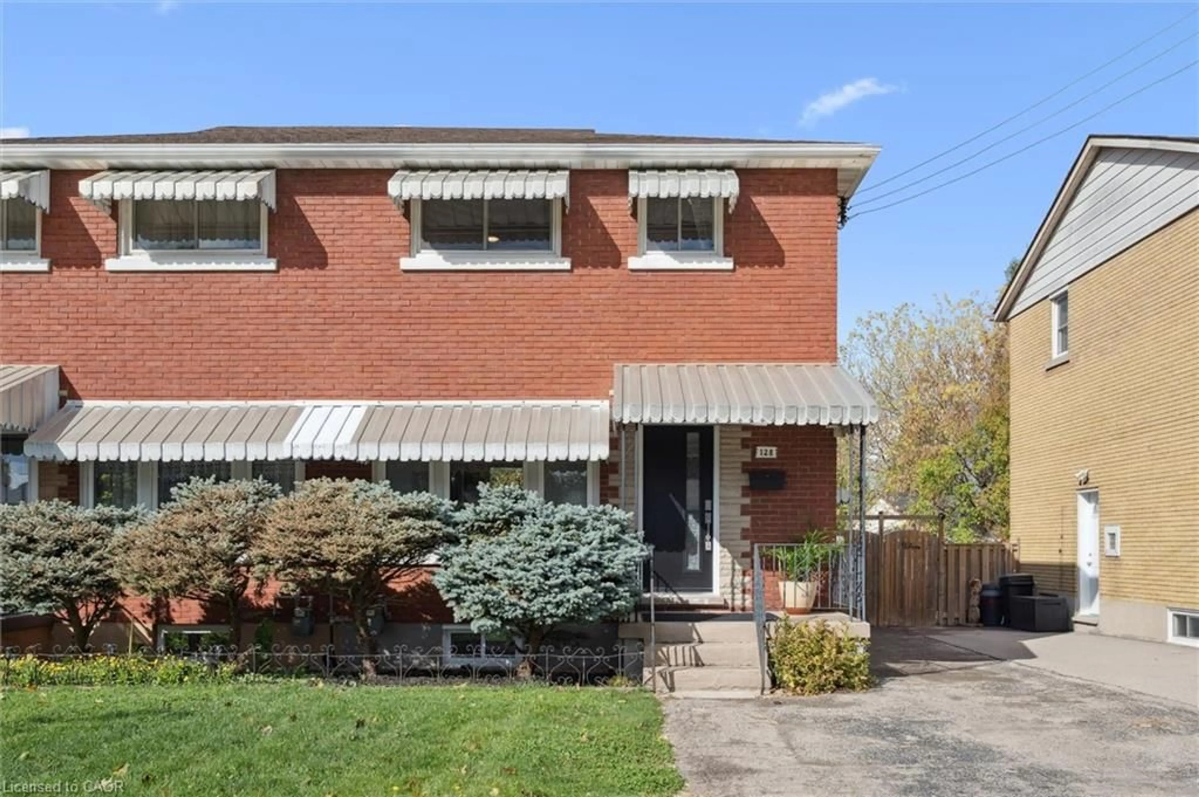 Home with brick exterior material, street for 128 Donald St, Kitchener Ontario N2B 3G8