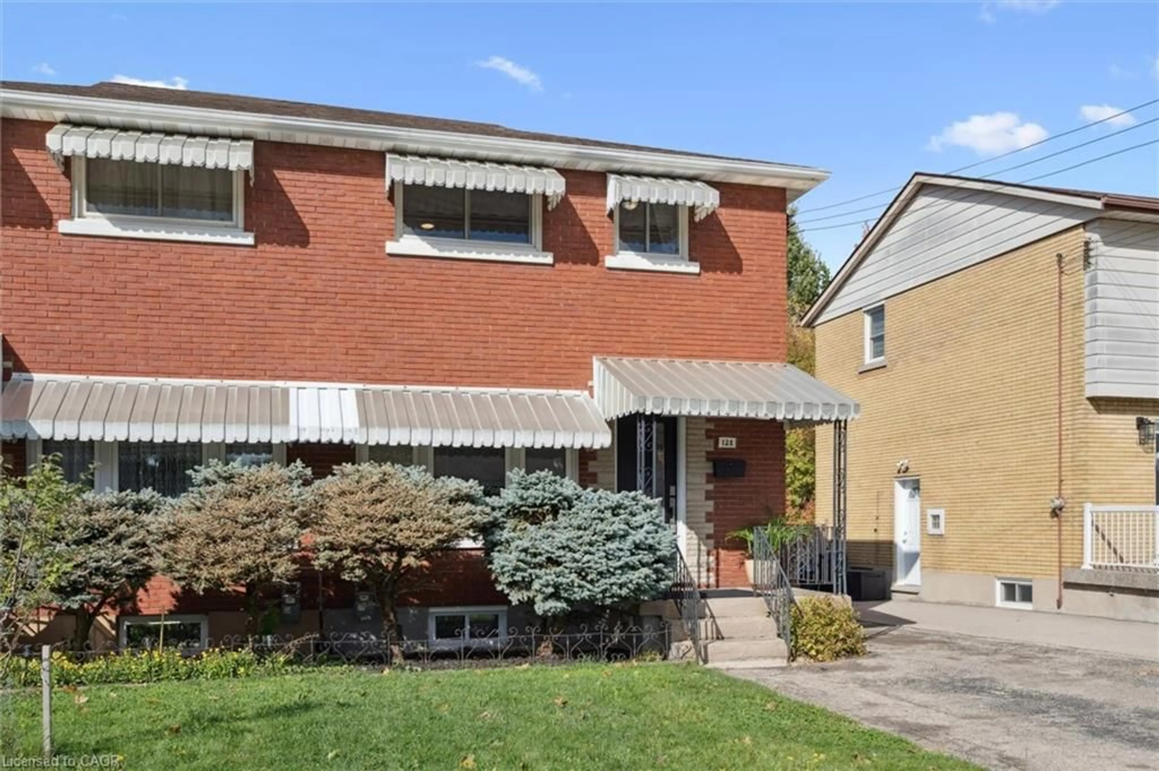 Home with brick exterior material, street for 128 Donald St, Kitchener Ontario N2B 3G8