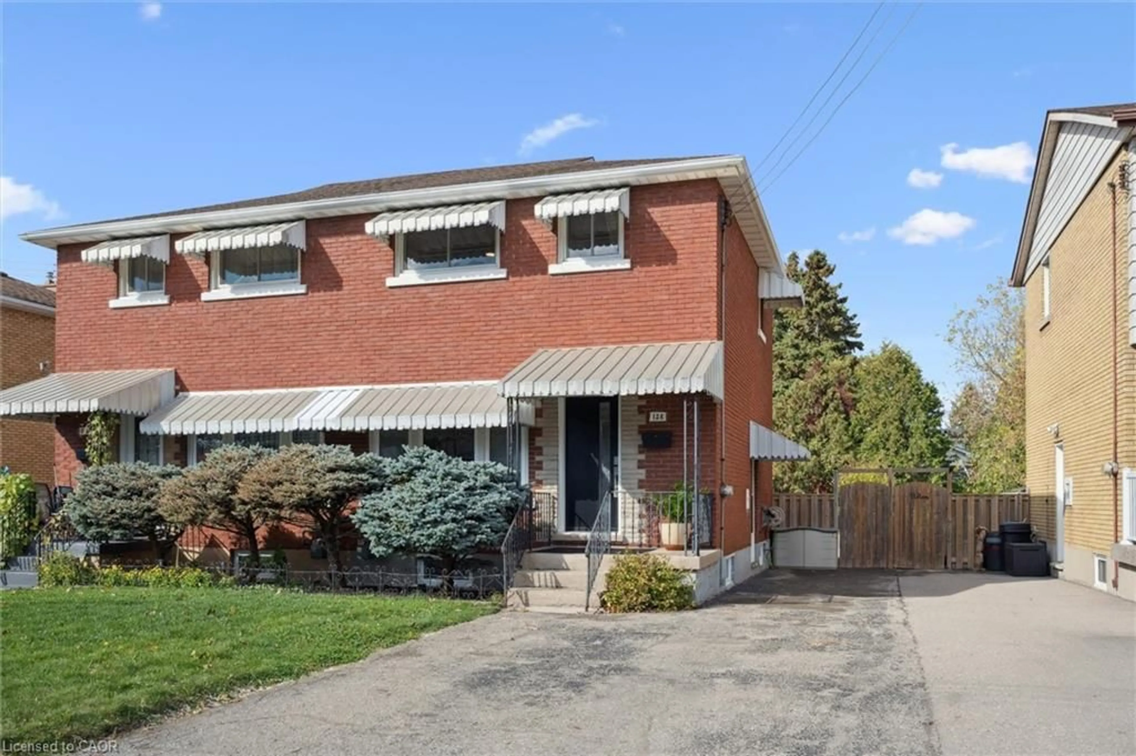 Home with brick exterior material, street for 128 Donald St, Kitchener Ontario N2B 3G8