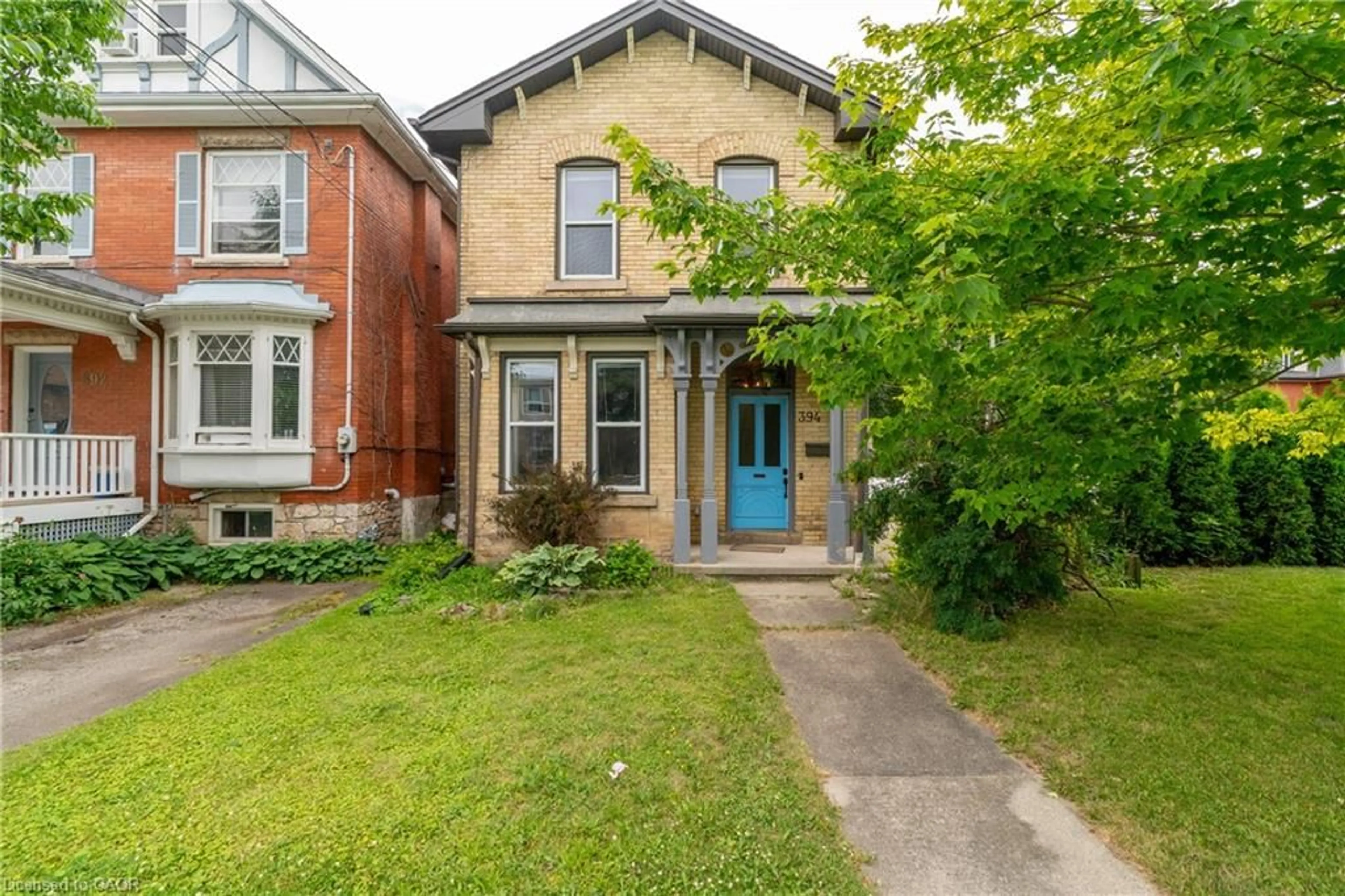 Home with brick exterior material, street for 394 Woolwich St, Guelph Ontario N1H 3Y7