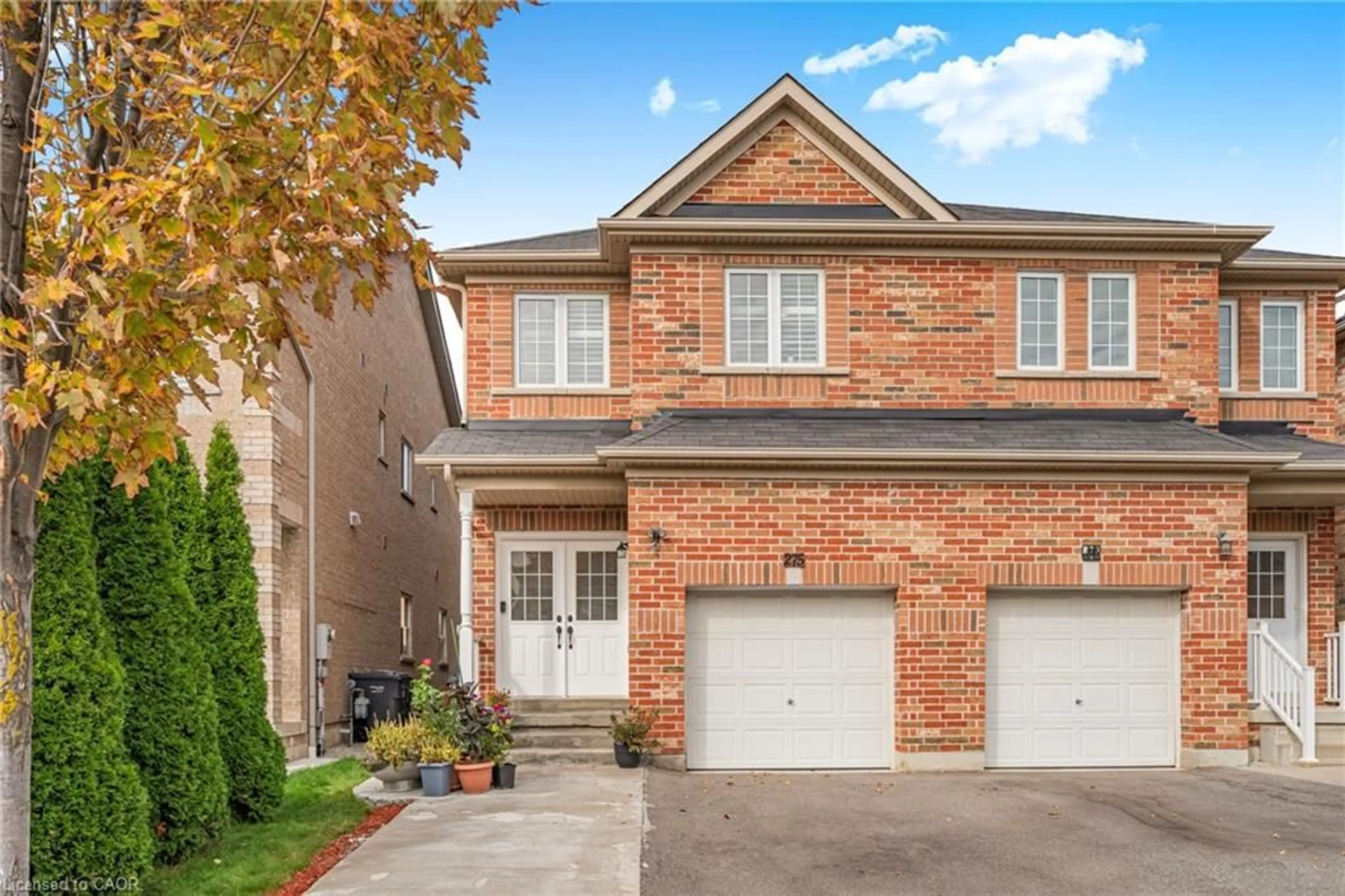 Home with brick exterior material, street for 275 Comiskey Cres, Mississauga Ontario L5W 0C4