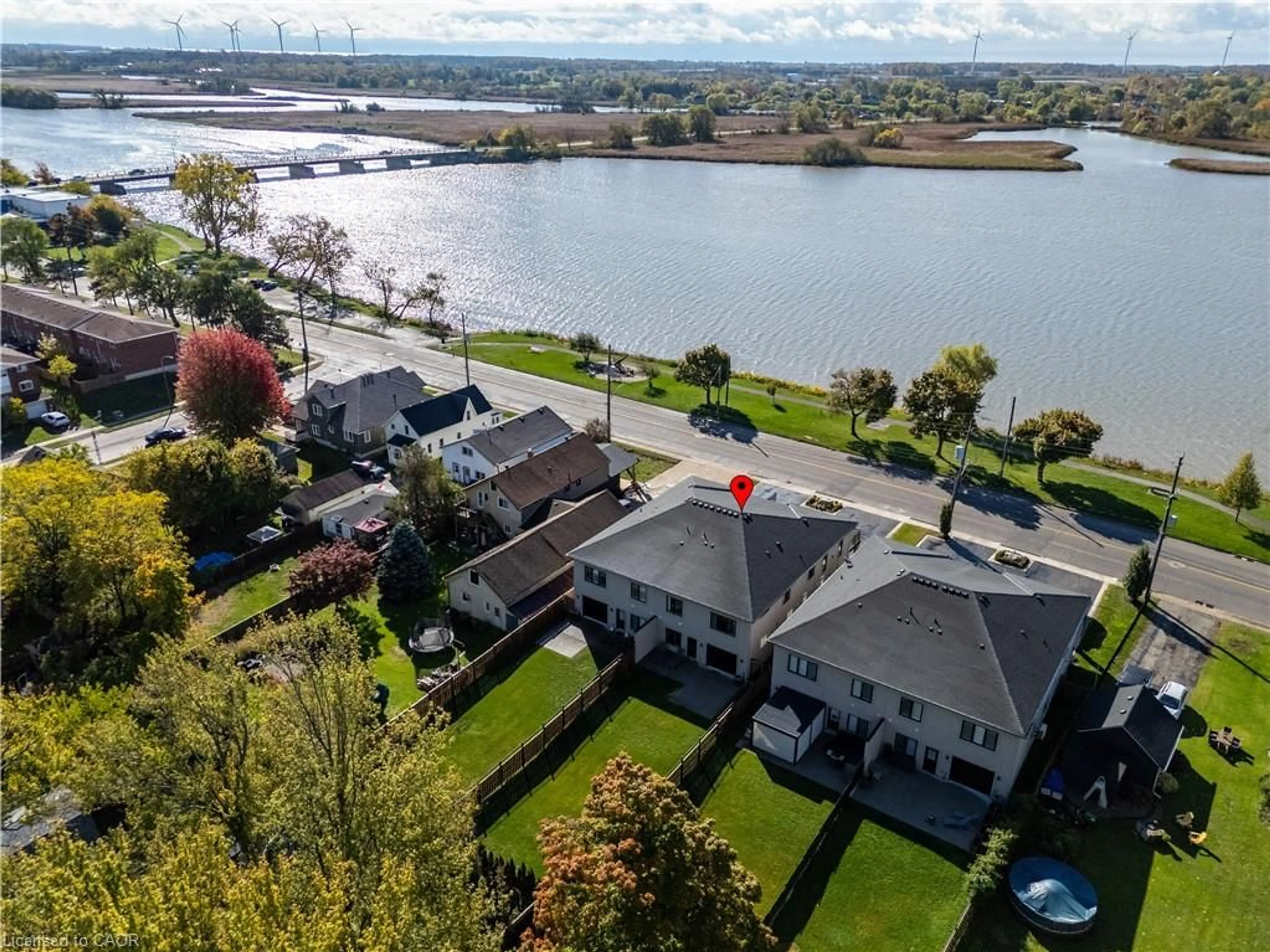 A pic from outside/outdoor area/front of a property/back of a property/a pic from drone, water/lake/river/ocean view for 215 Main St, Dunnville Ontario N1A 1W2